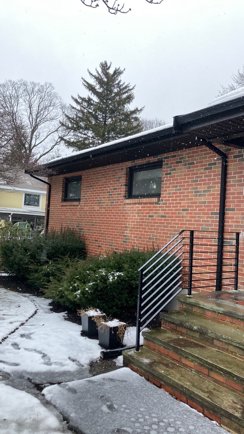 Black Gutters and Trim Can Really Transform the Look of a Home by Gutter Pro Enterprises