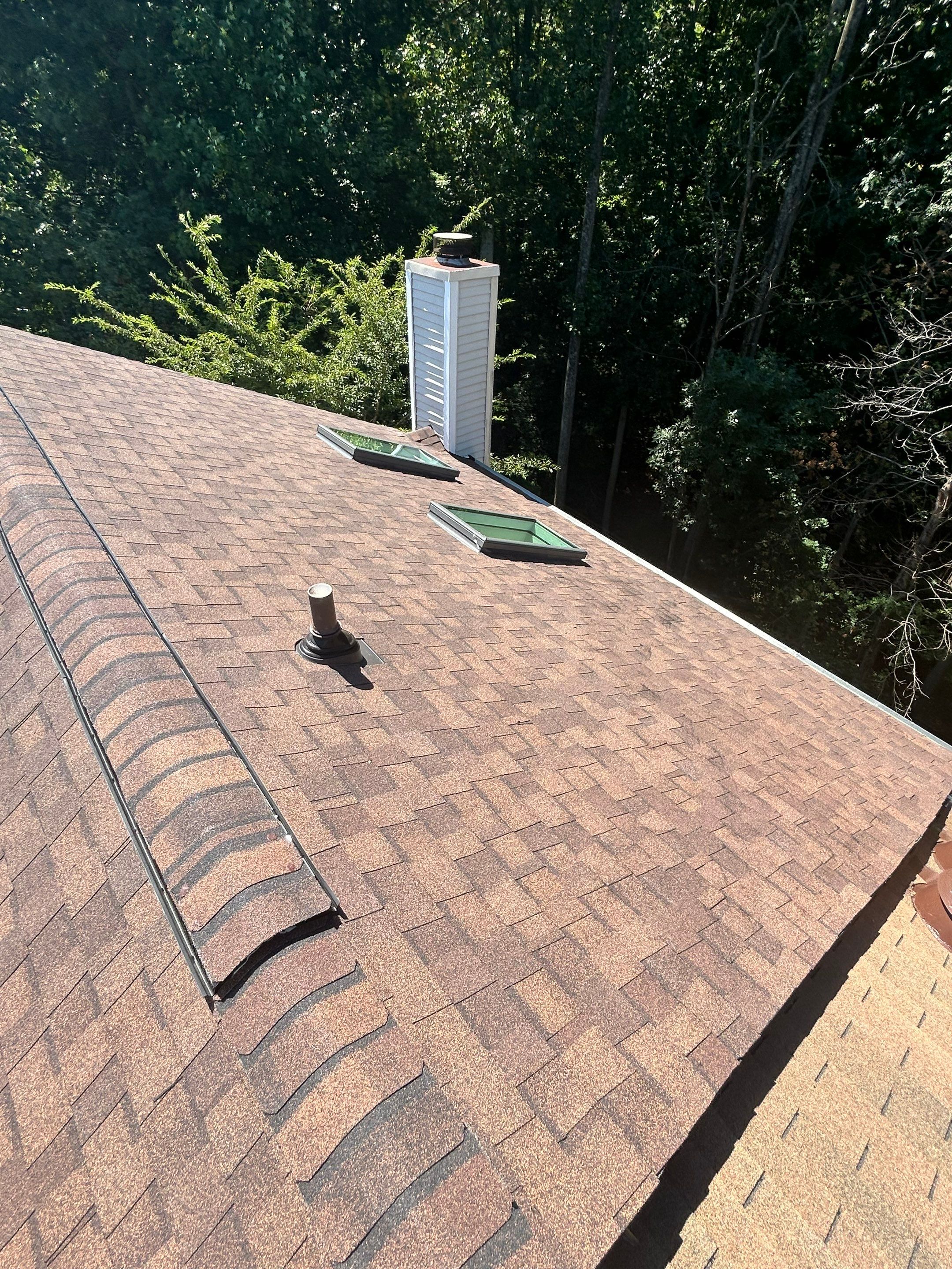 Montclair: Roof Installation with CertainTeed Landmark Designer Shingles in Burnt Sienna by RM Banning, Inc.
