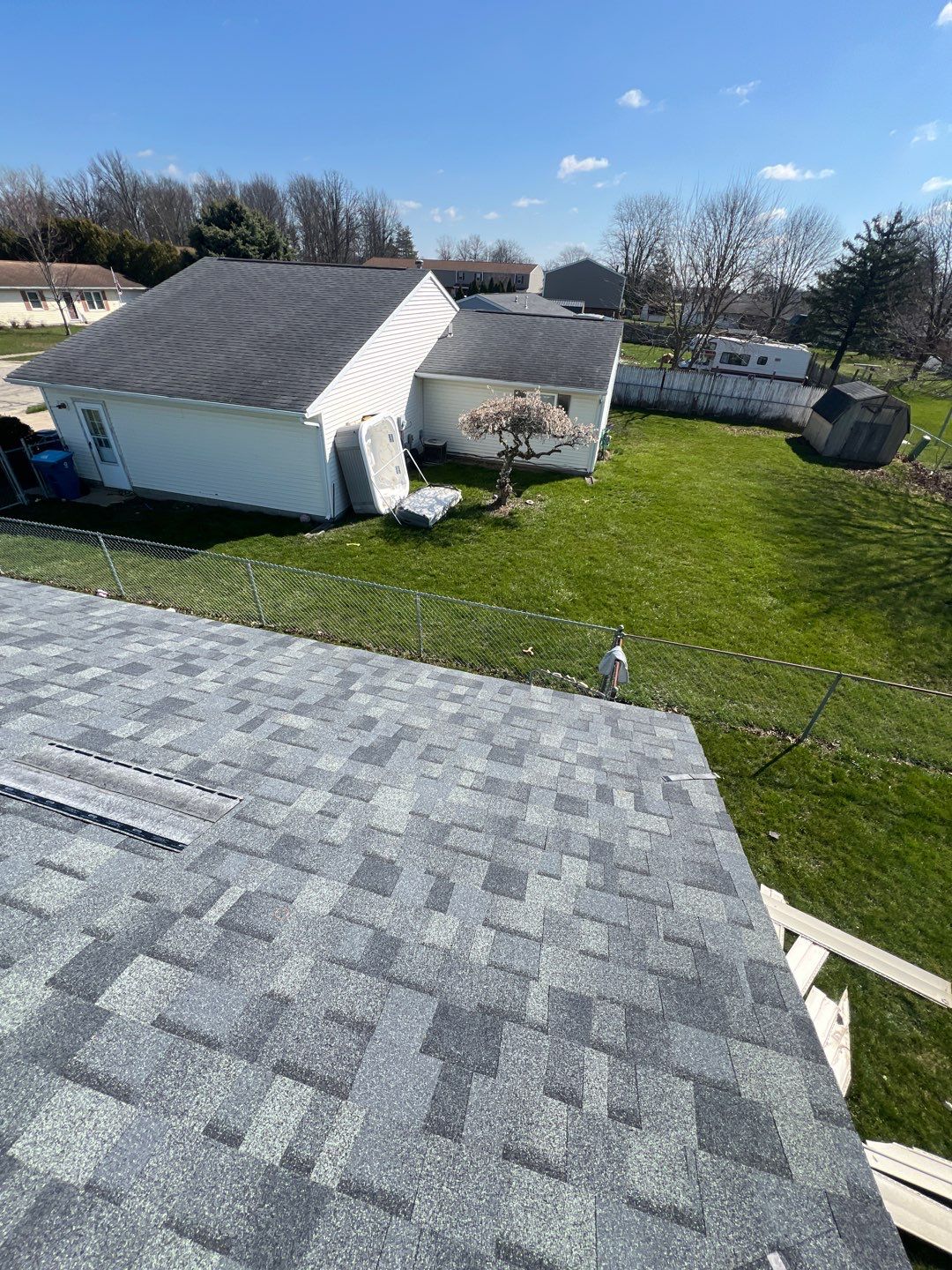 Storm Damage Residential Roof and Siding Installation by WIW Enterprises Inc