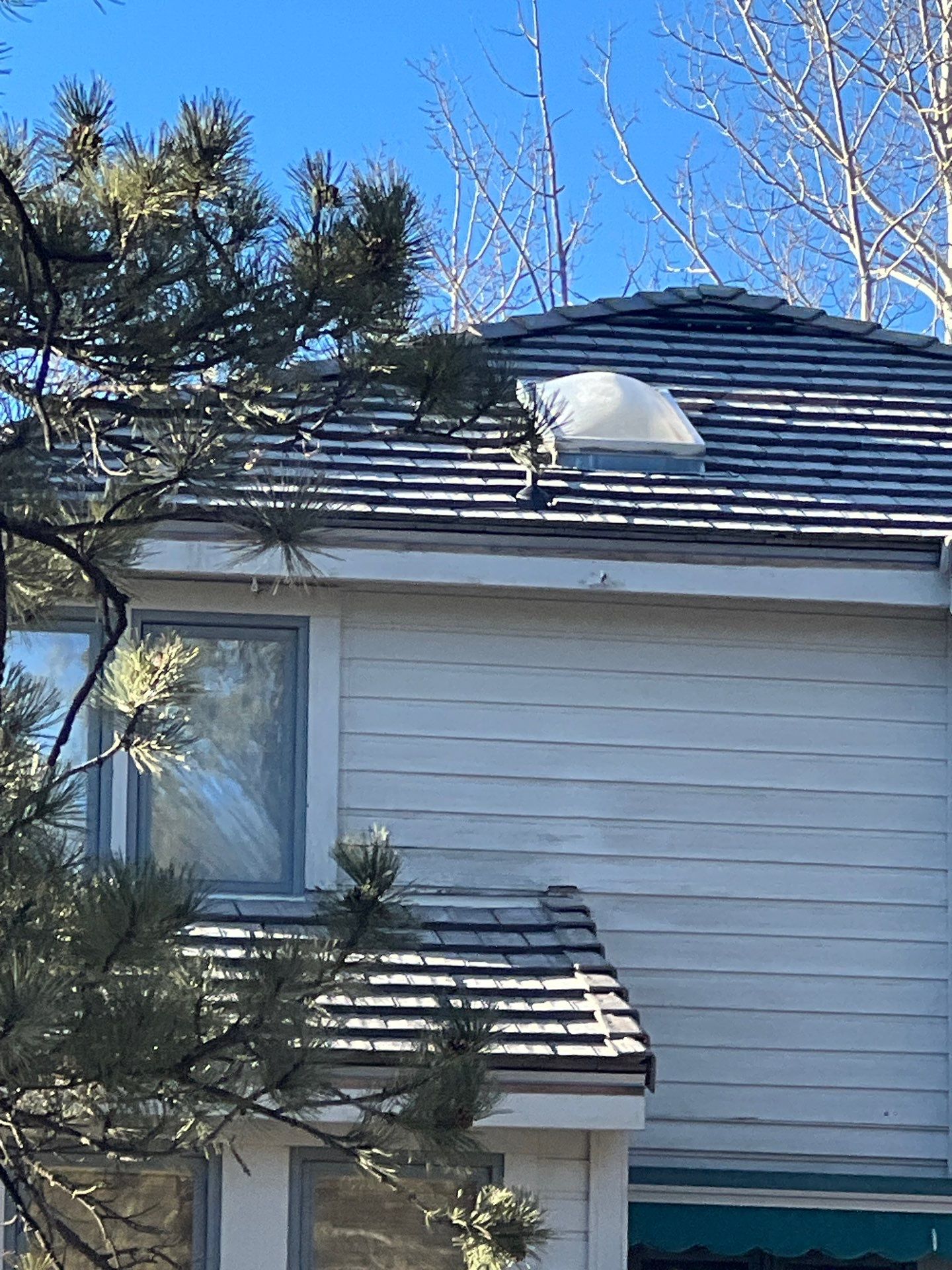 Residential Roofing Installation using Concrete Tile by Blue Peaks Roofing LLC 