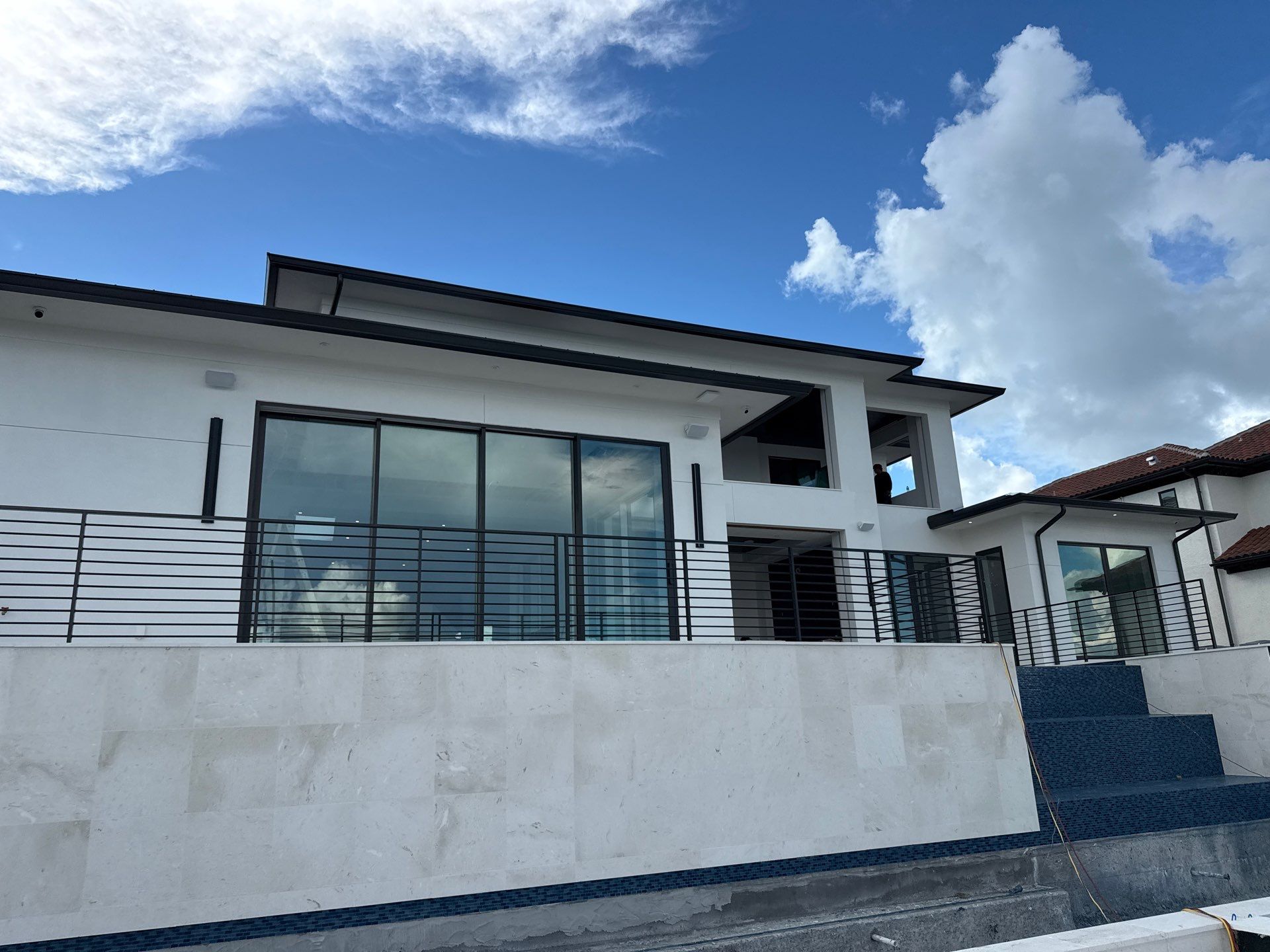 Seamless Aluminum Gutter Installation using black seamless gutters in Sarasota FL by Gutter Professors