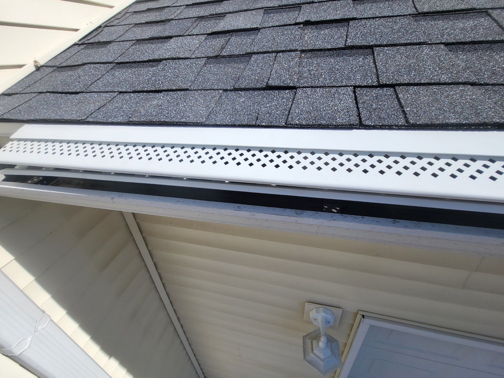 Residential Roofing & Downspouts Install  by Titan Commercial & Residential Roofing 