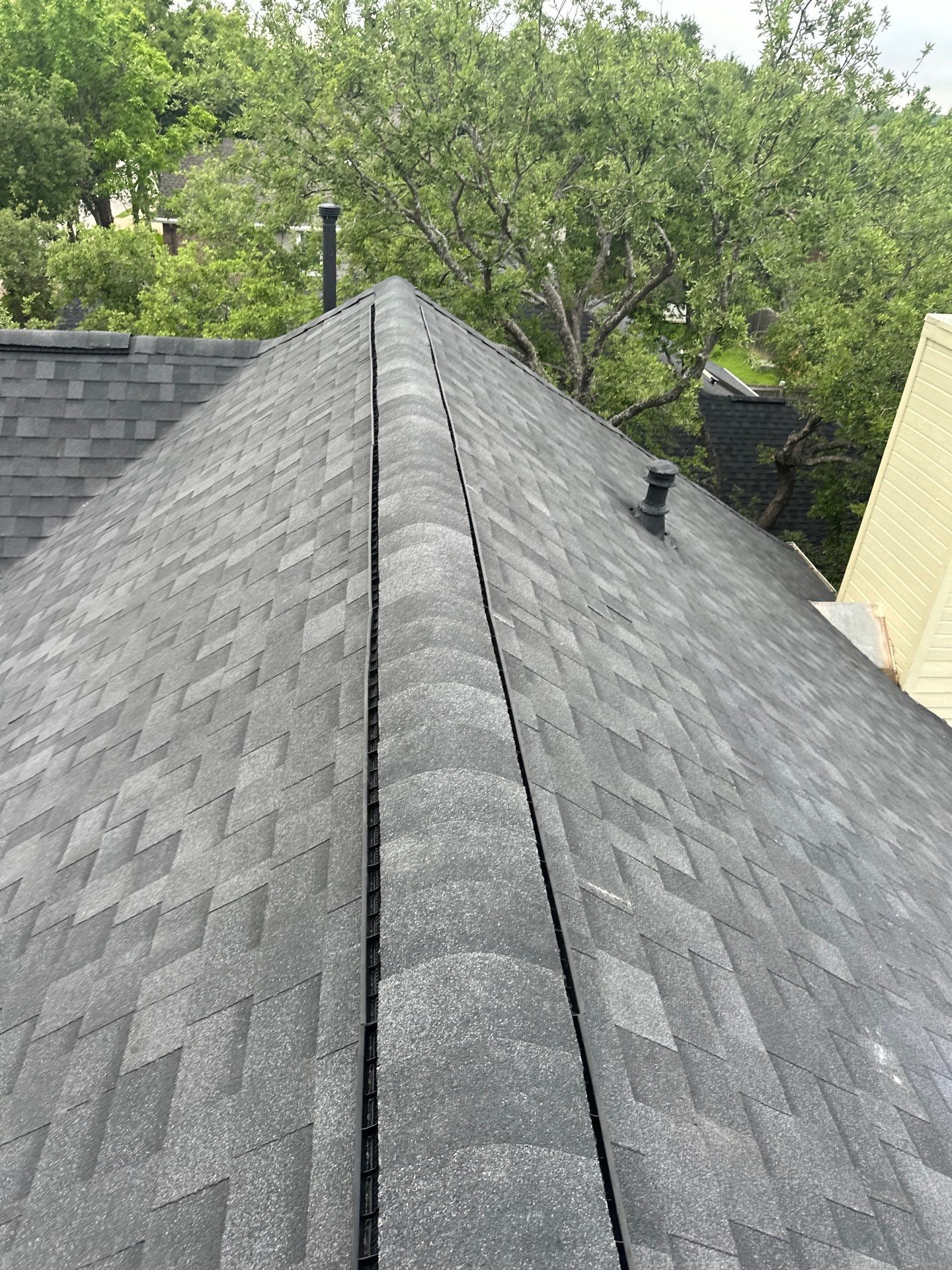 Residential Roofing Installation using IKO Cambridge Dual Black by DeZign Roofing & Exteriors