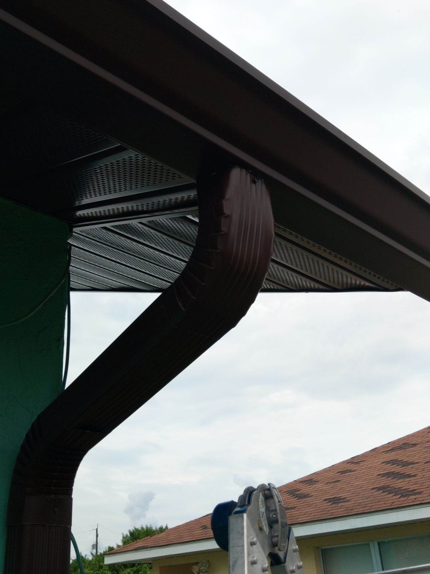 Aluminum Downspouts and Elbows in Englewood FL by Gutter Professors