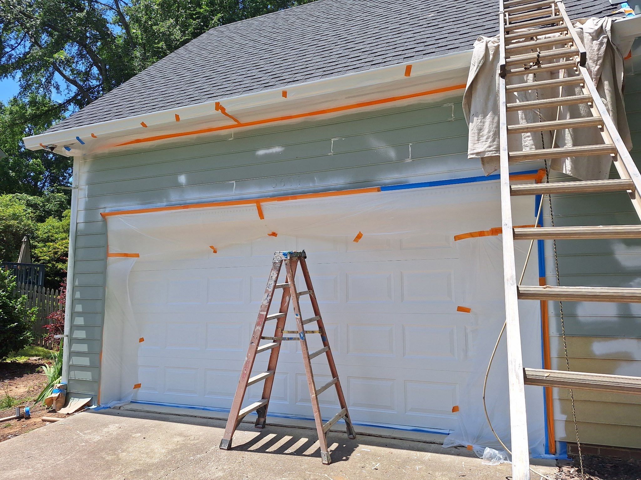 Siding Replacement and painting by GonzalezPainters & Contractors Inc 