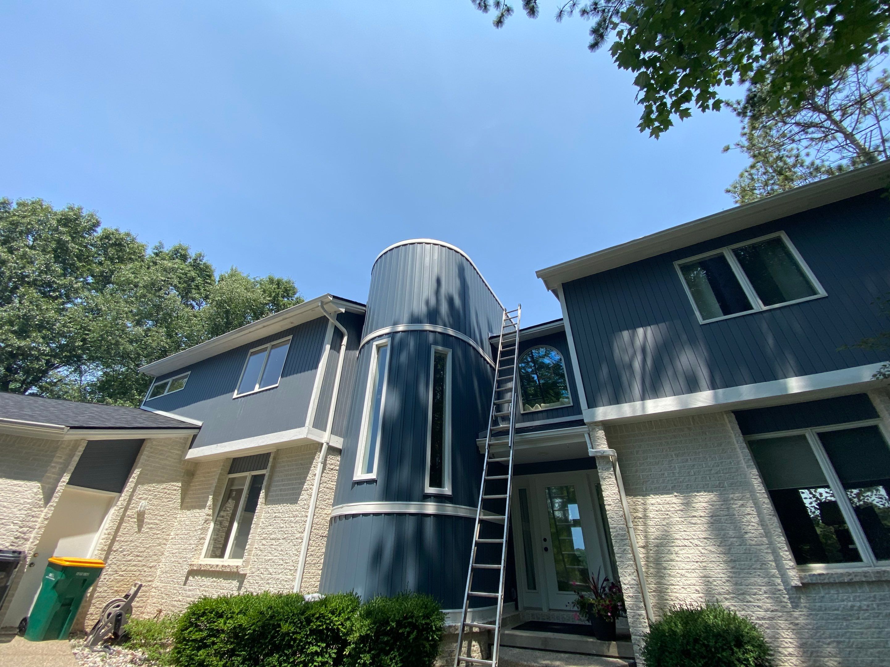 Siding Replacement using CertainTeed Board & Batten Pacific Blue by 180 Contractors