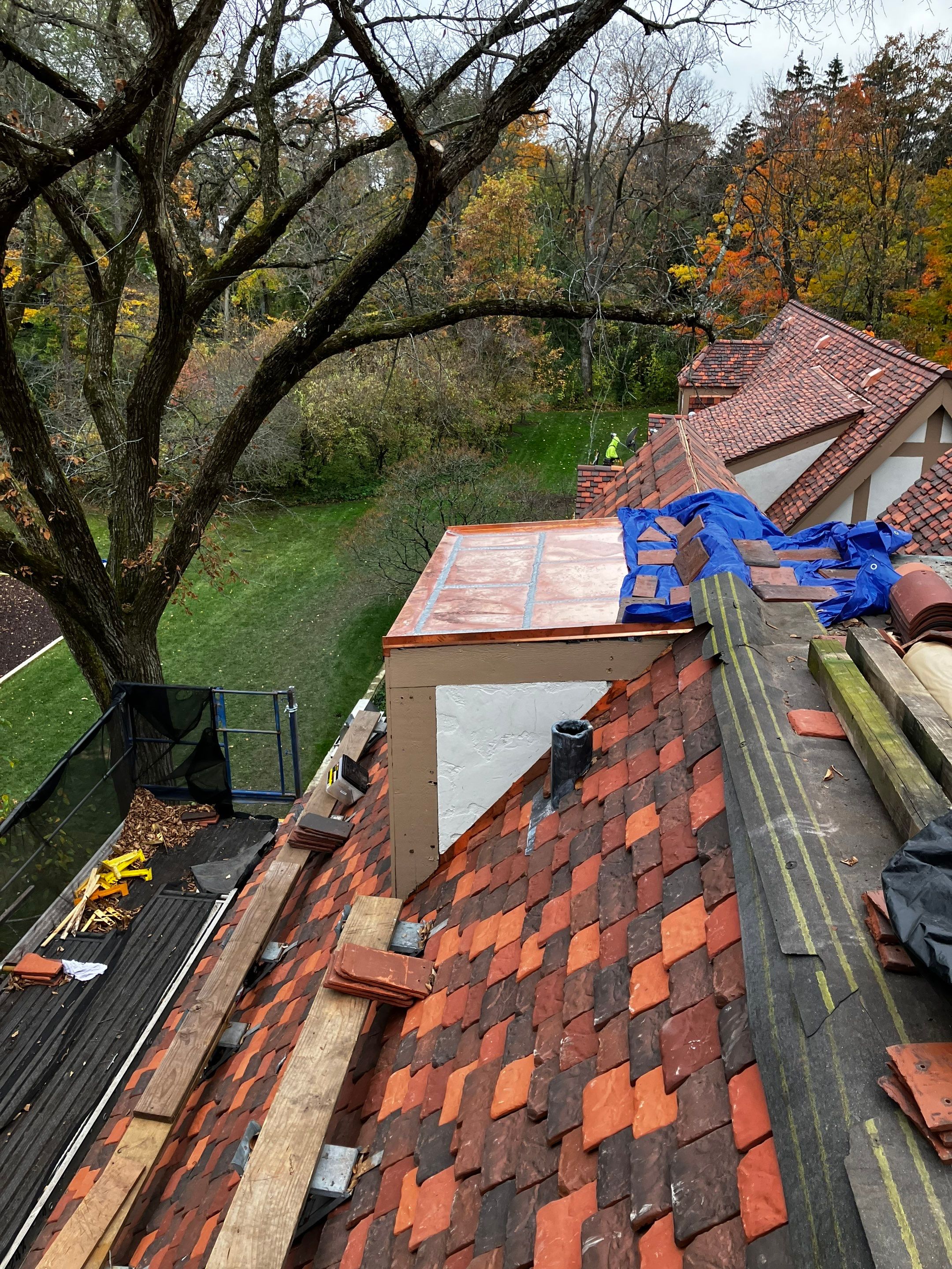 Ludowici Roof Installment and Half Round Copper Gutter Replacement  by Custom Installations