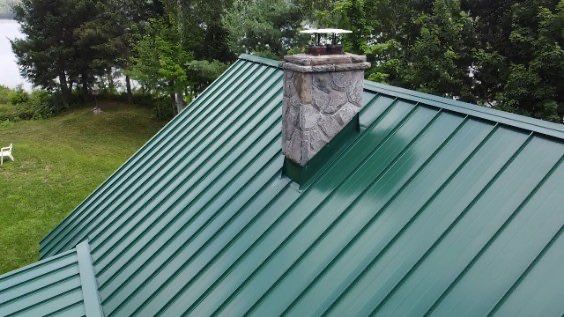 Roof Replacement using 16" Standing Seam Panels by Jay Carter Roofing & Sheet Metal