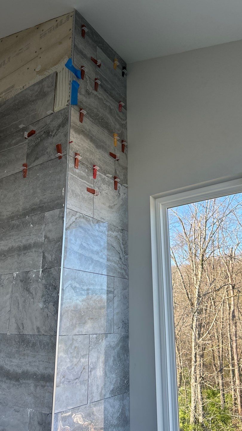Floor to Ceiling Fireplace Surround by Footprints Floors of Nashville