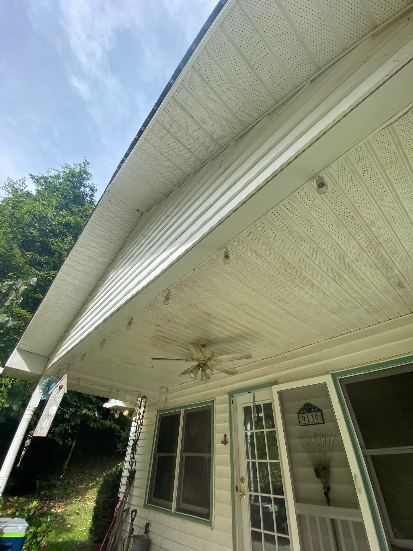 the service shown is cleaning the porch ceiling and exterior siding to remove dirt and stains from the surfaces