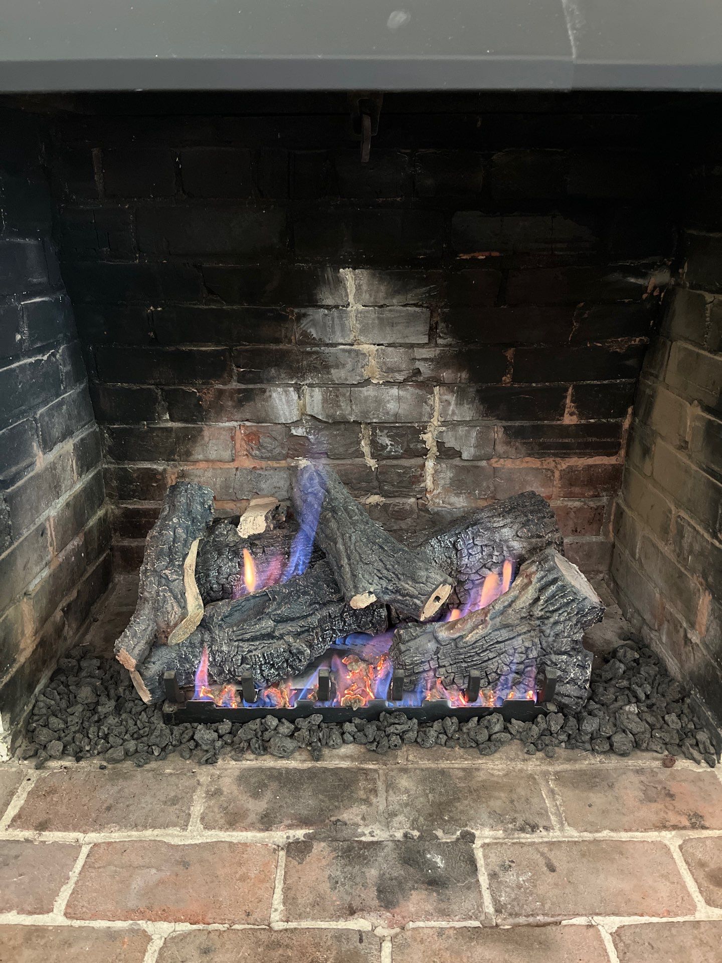 Gas Logs in Norfolk by Premier Chimney and Roofing