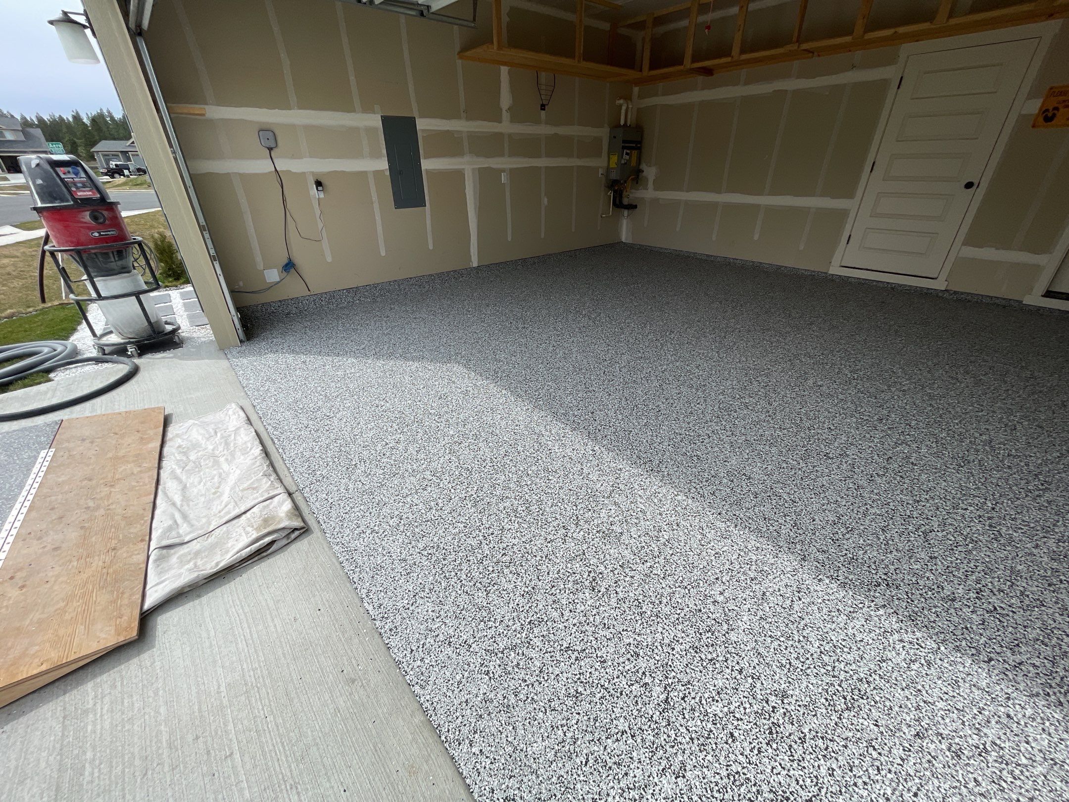 Garage Transformation using Domino by Croc Coatings, LLC
