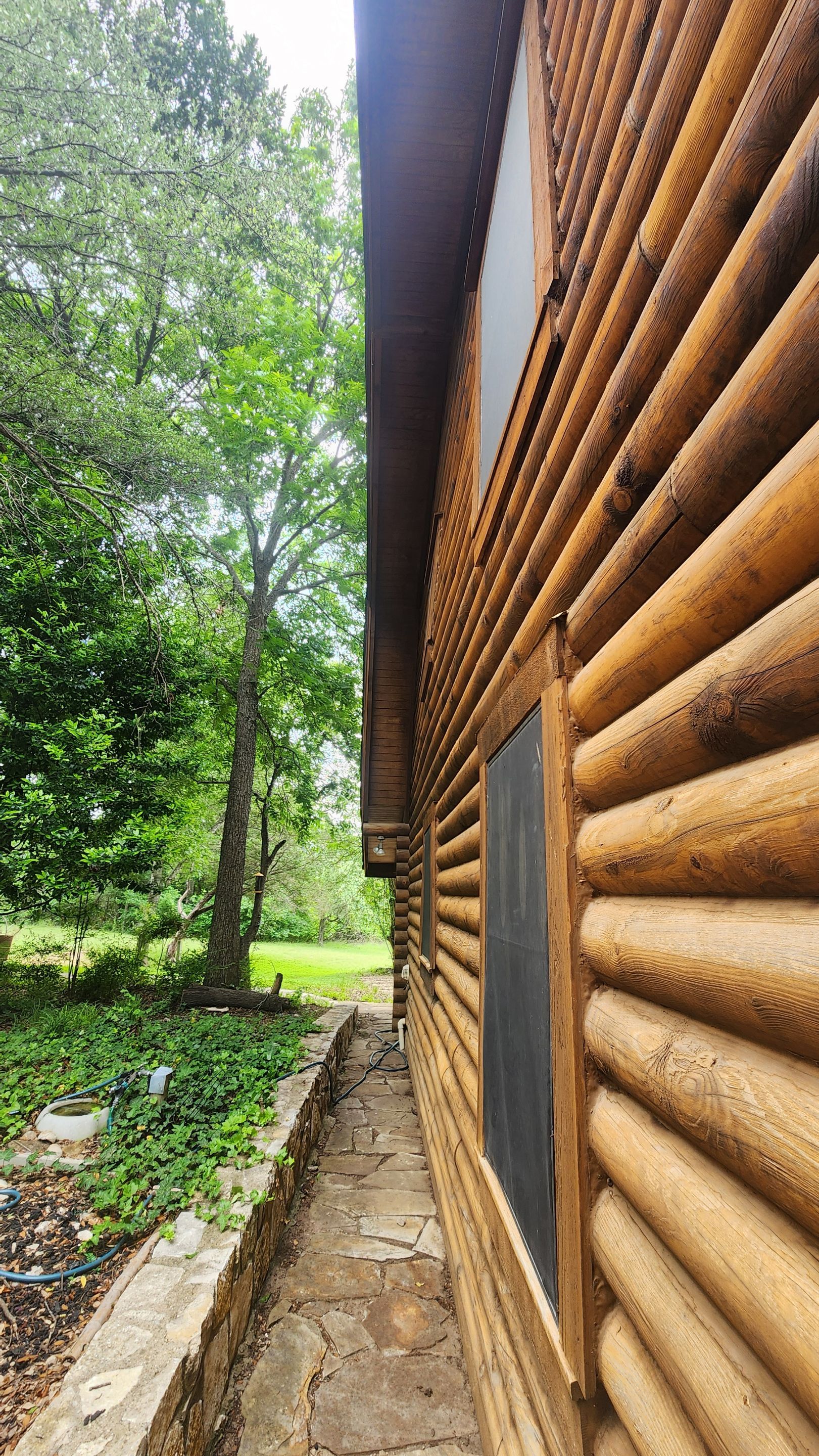 Fort Worth Log Home Roof Replacement and Gutter System Service by Performance 1 Roofing