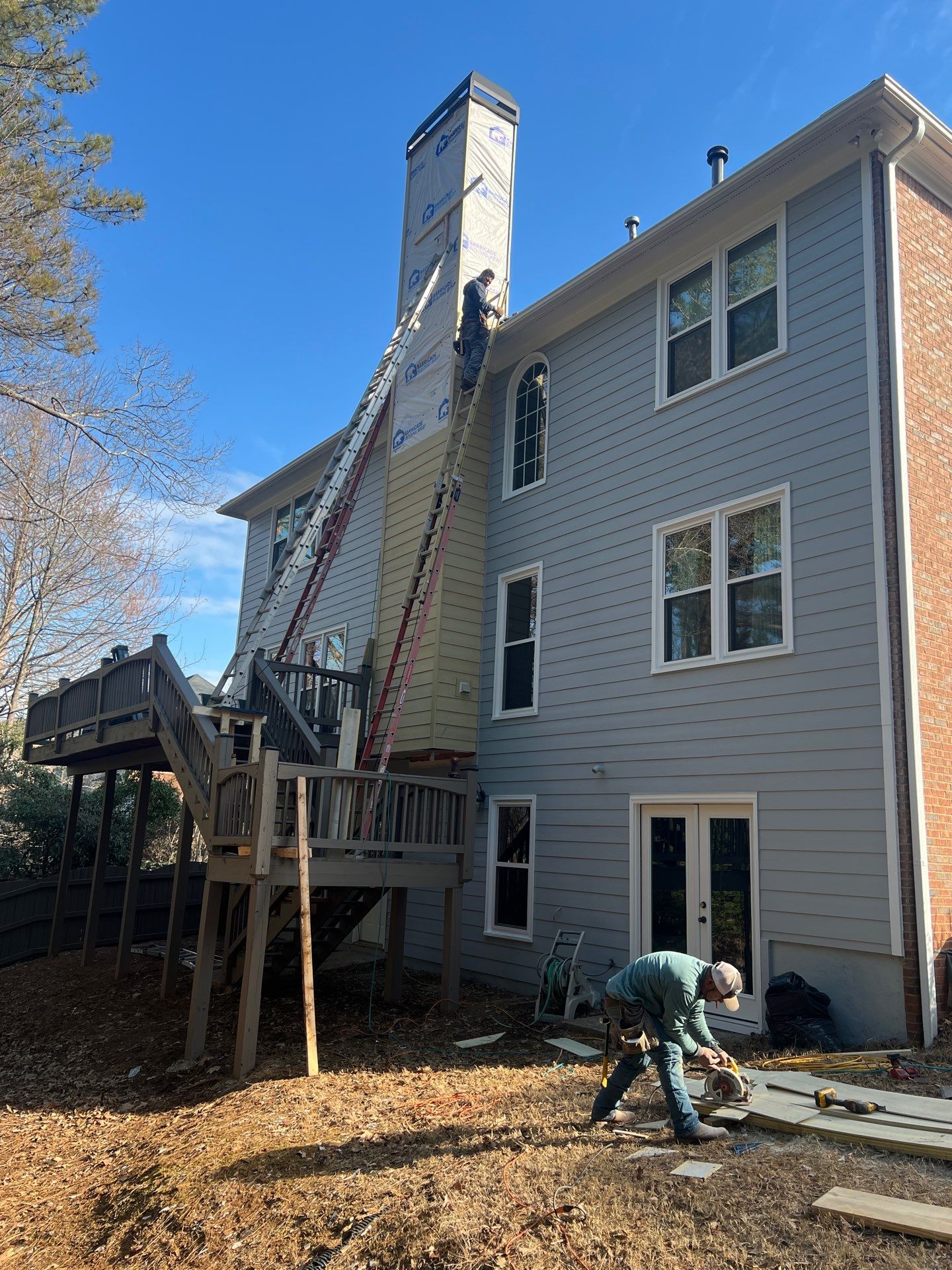 Chimney Siding Reconstruction and Full Exterior Painting in Marietta by Swift Home Renovations