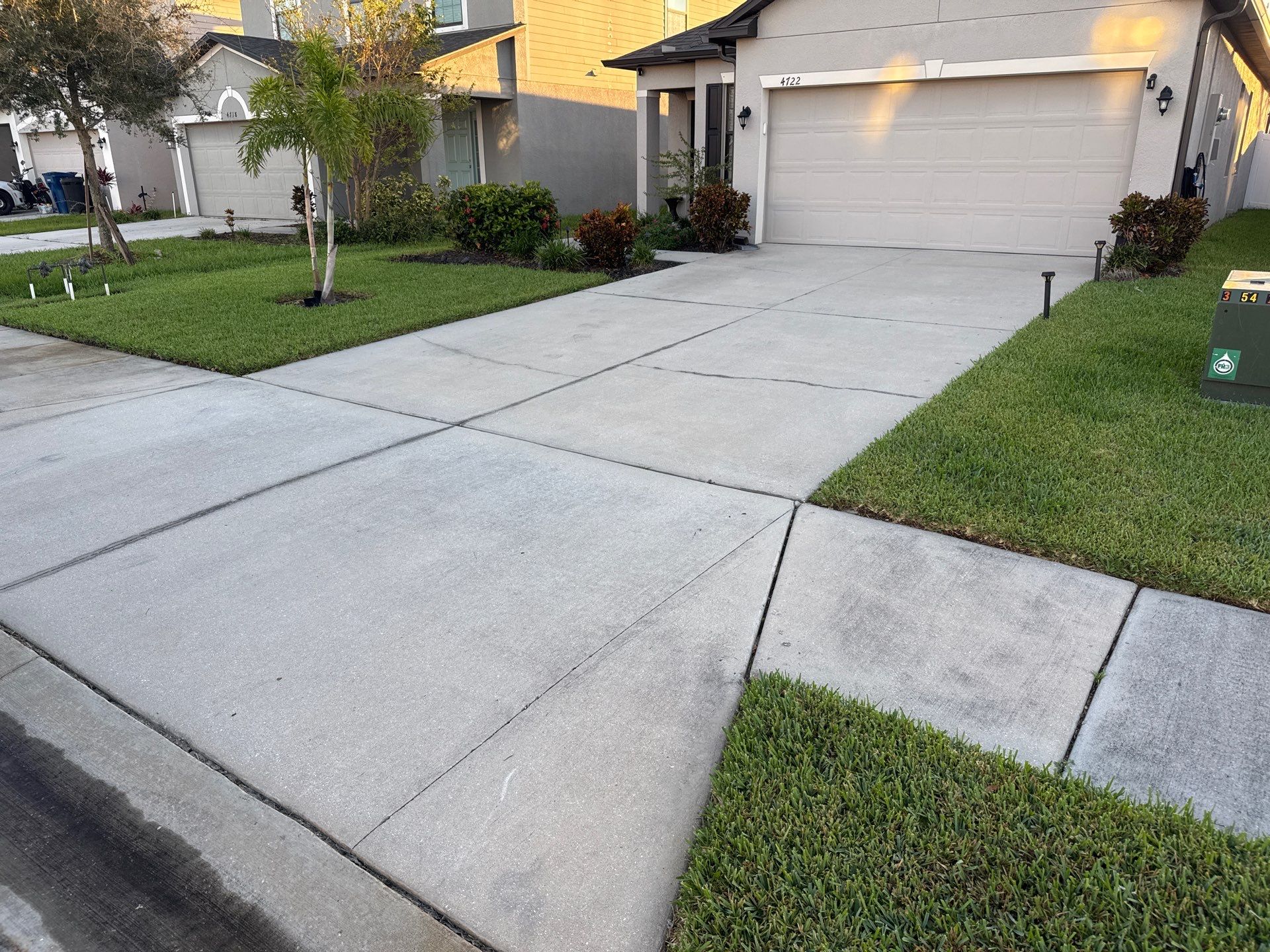 Concrete Driveway, Sidewalk, Street Curbing, and Entryway Cleaning in Willow Walk Community, Palmetto, FL by Sunshine AquaWash