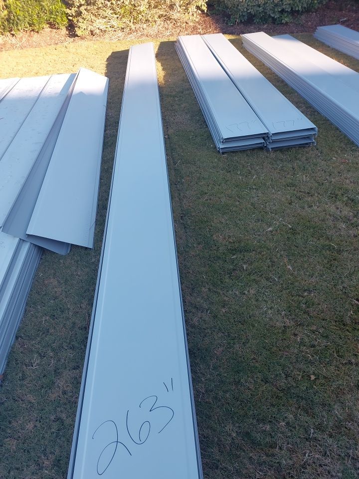 Large Metal Roof Transformation by Gallop Roofing & Remodeling, Inc.