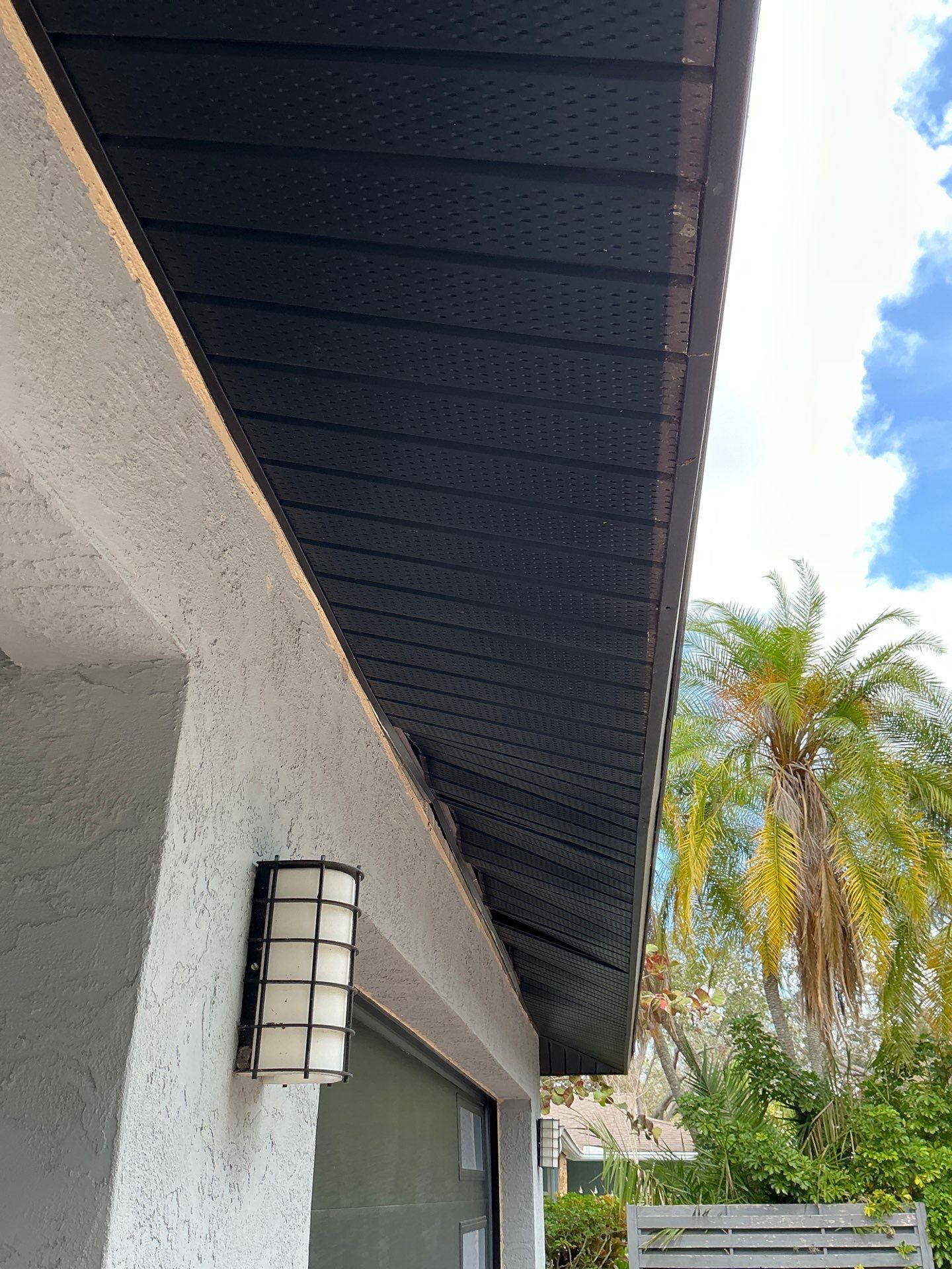 Gutter Repair Service in Sarasota FL - Black Soffit by Gutter Professors
