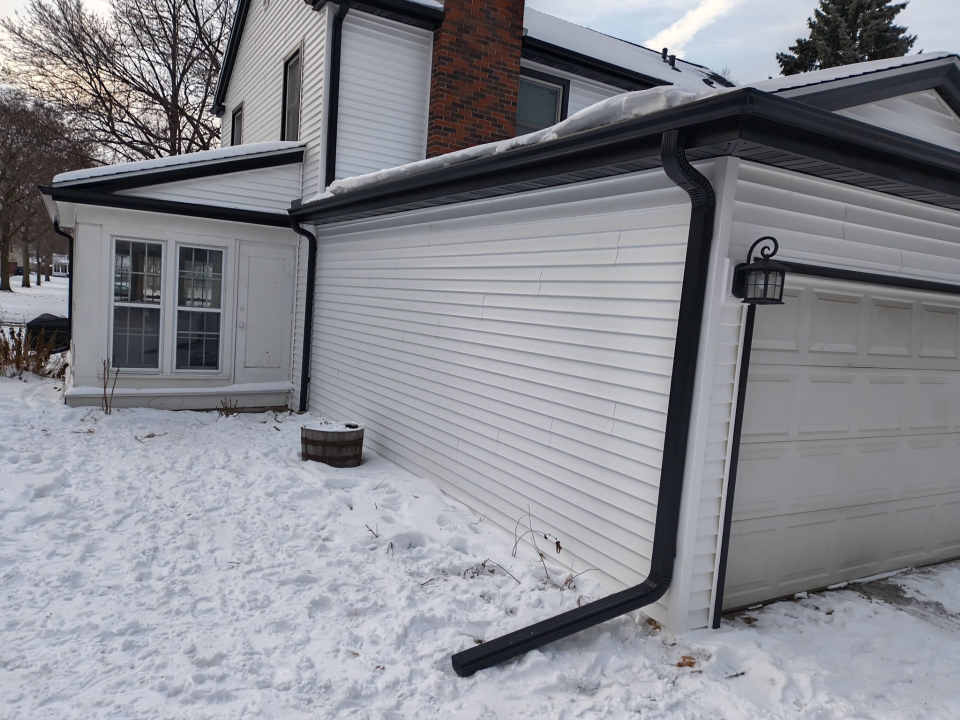 5-Inch Black Gutter Installation – Minneapolis, MN by Next Level Seamless Gutters / Exteriors Inc.