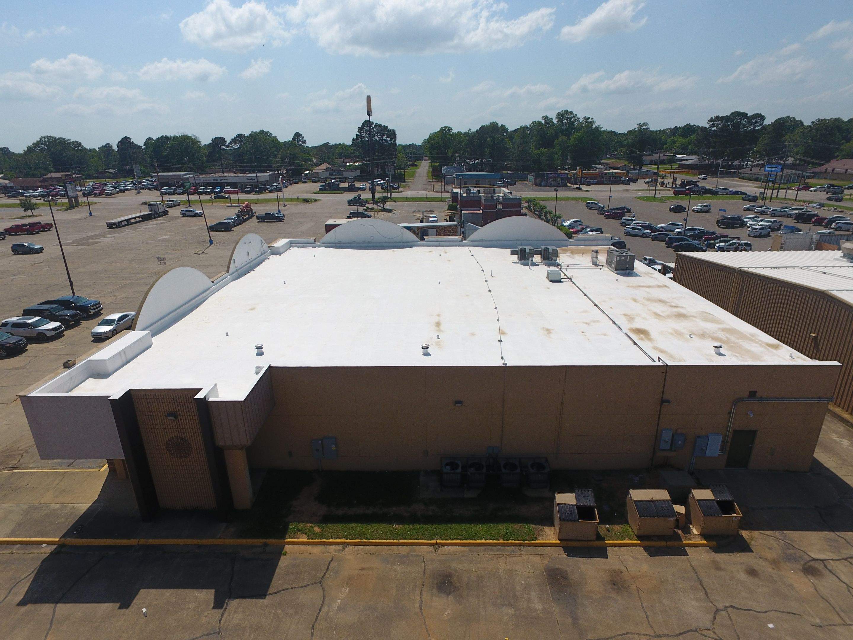 Commercial Roofing Installation using Aldocoat Coatings by Hostetler Roofing