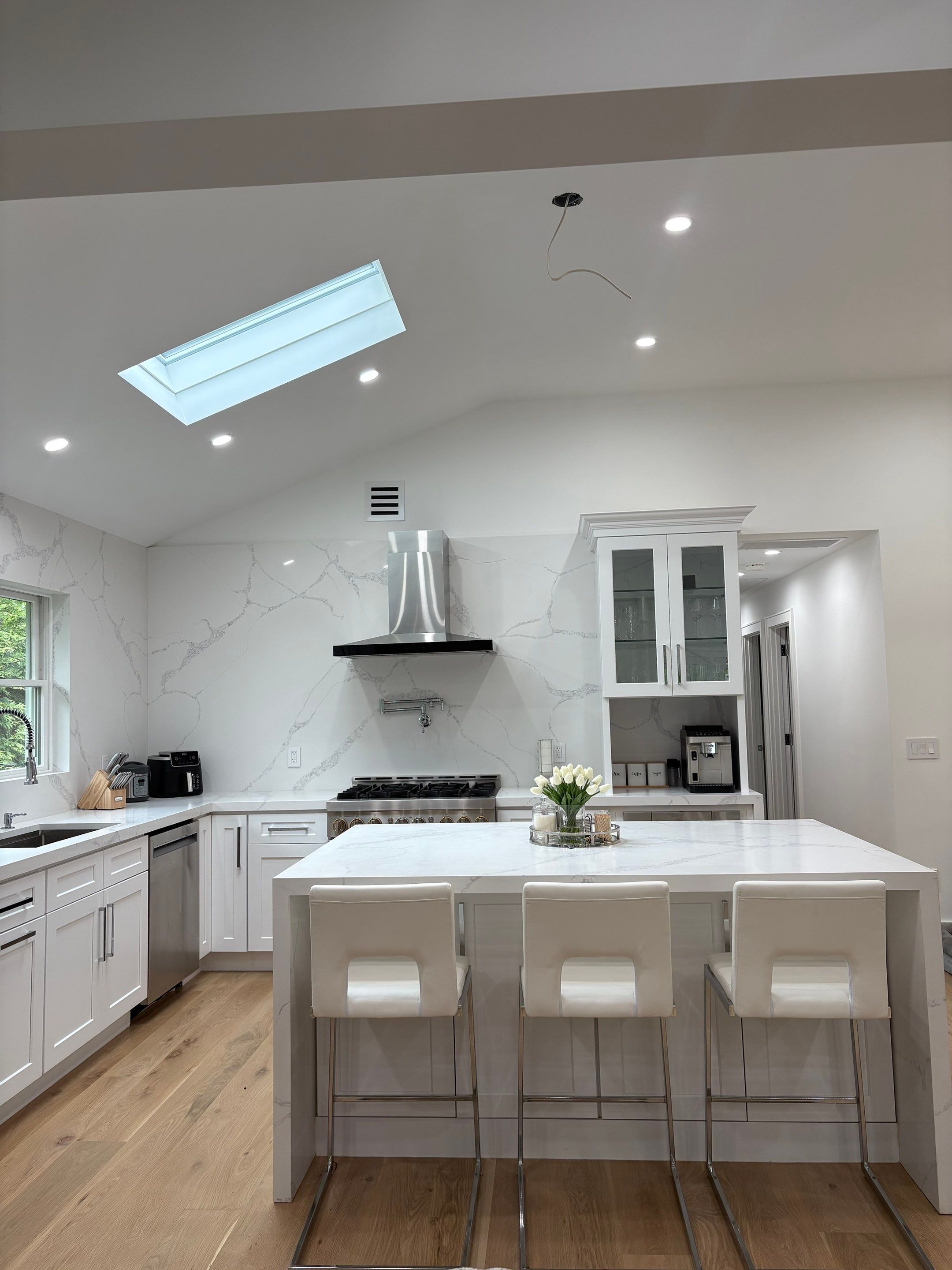 Cabinet Installation using white shaker by Antrax Corp