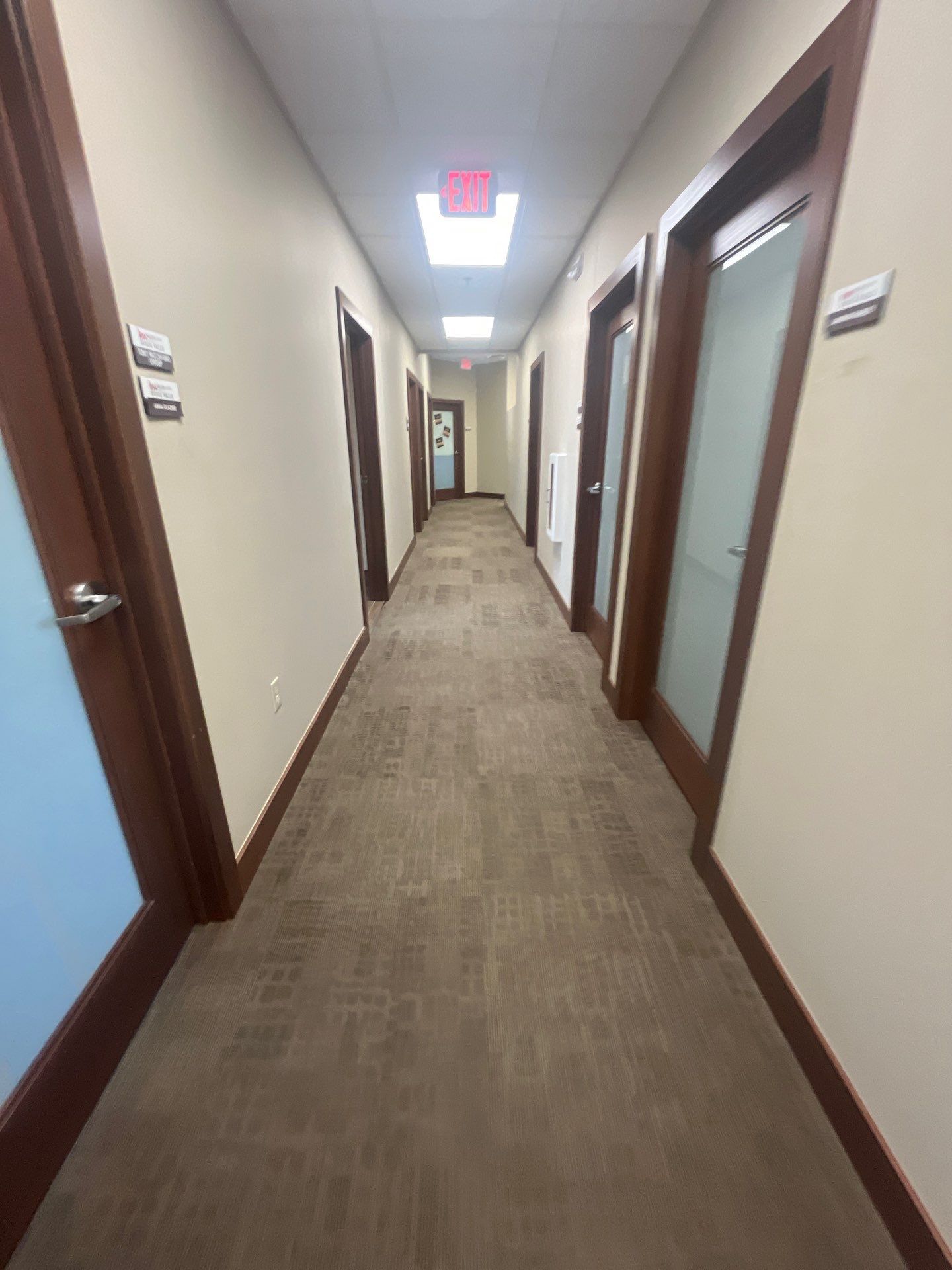 Commercial Office Interior Remodel and Modern Suite Refresh in Sioux Falls by Select Painting, Coatings & Garage Cabinets