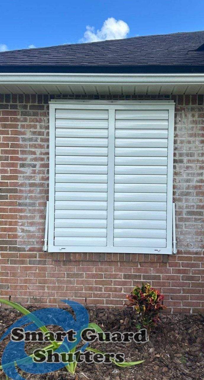 Impact Bahama Shutters in Signal White by Smart Guard Shutters