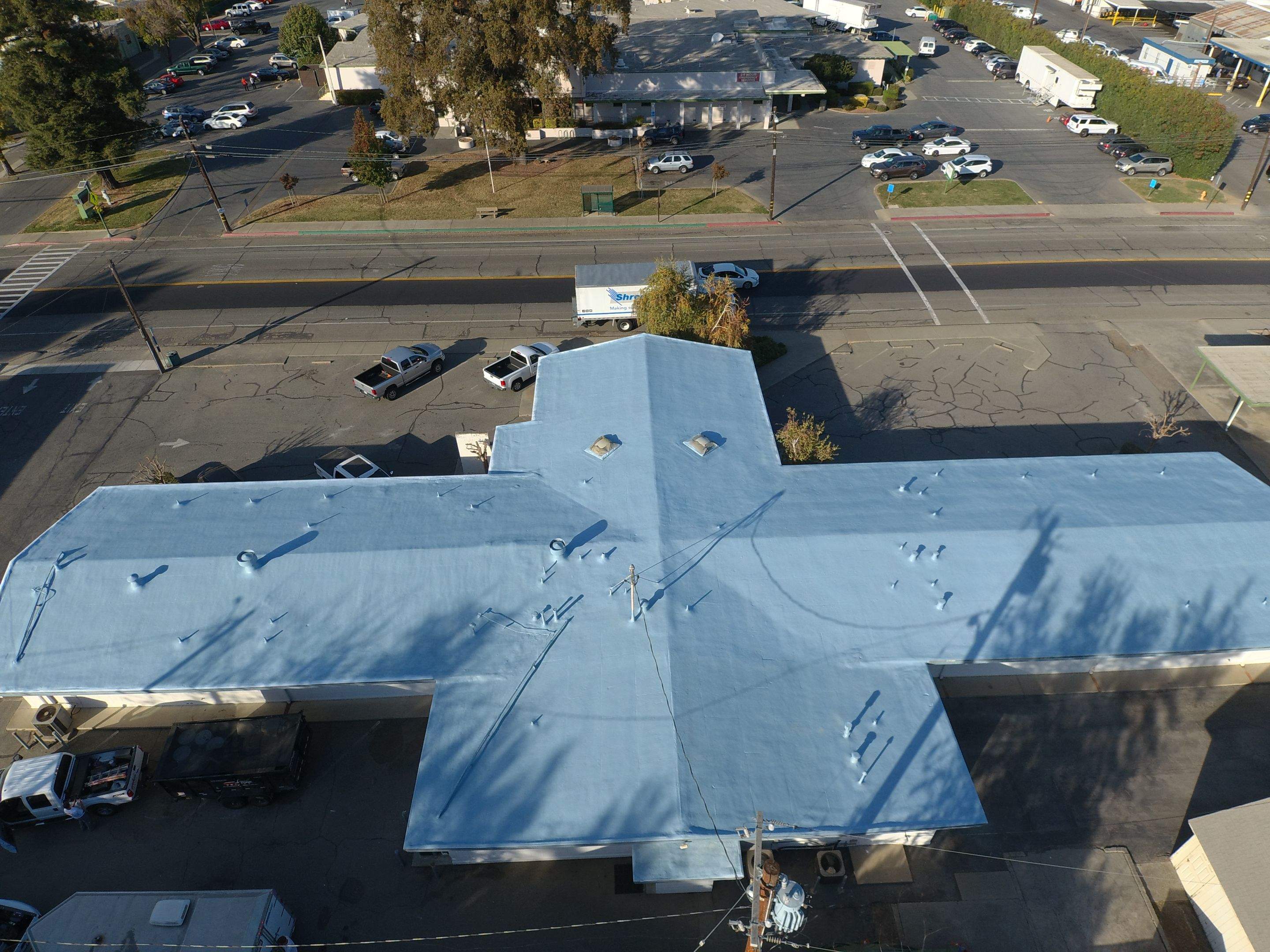 Spray foam and coatings using Conklin Benchmark/PUMA XL coatings and spray foam by Straight Edge Roofing Inc
