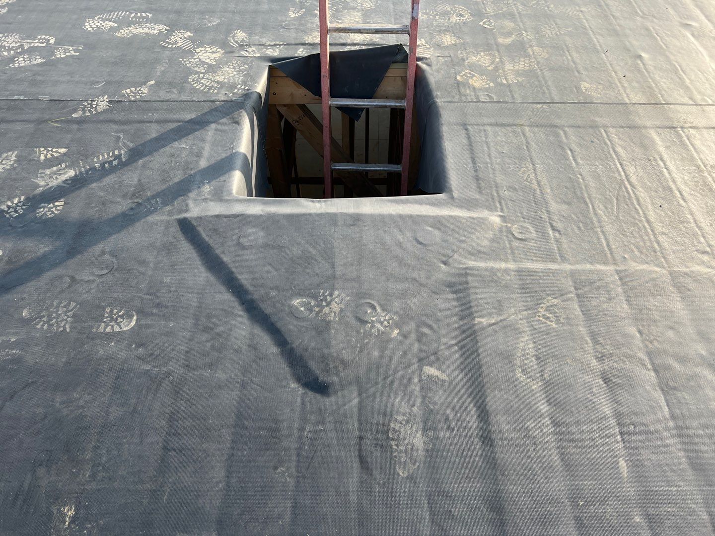Commercial Roofing Installation using 60 mil rubber roof  by Nitro Roofing and Construction