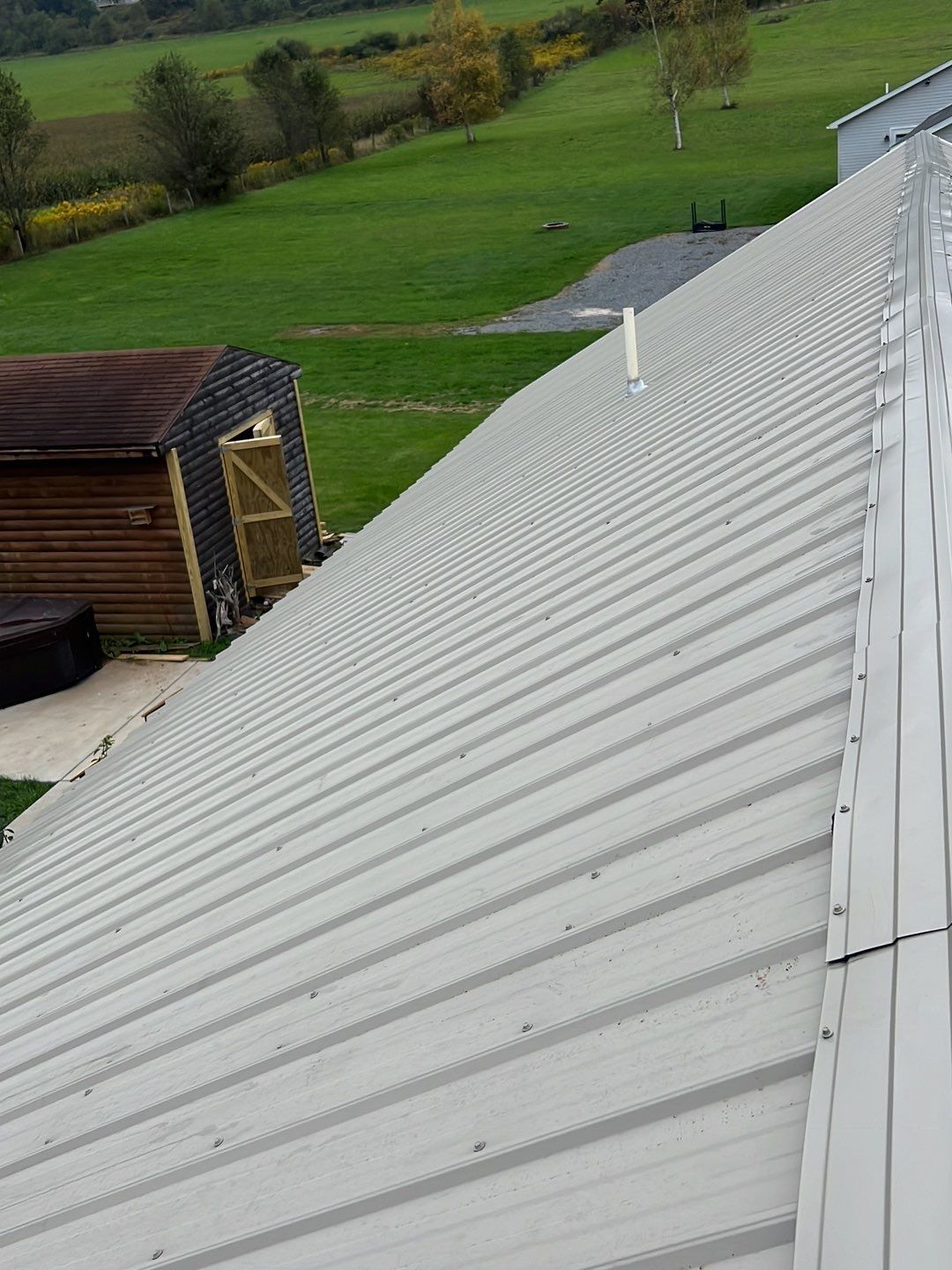 Light Stone Exposed Fastener by Reimagine Roofing