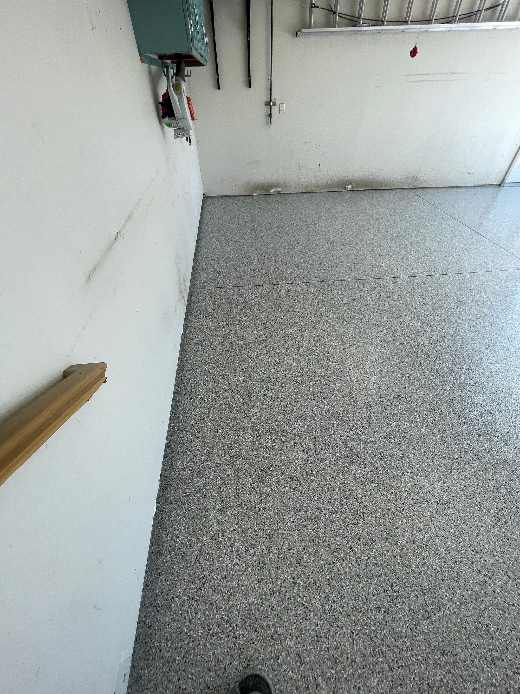 Multi-Stall Garage Floor Coating Installation in Sioux Falls by Select Painting, Coatings & Garage Cabinets