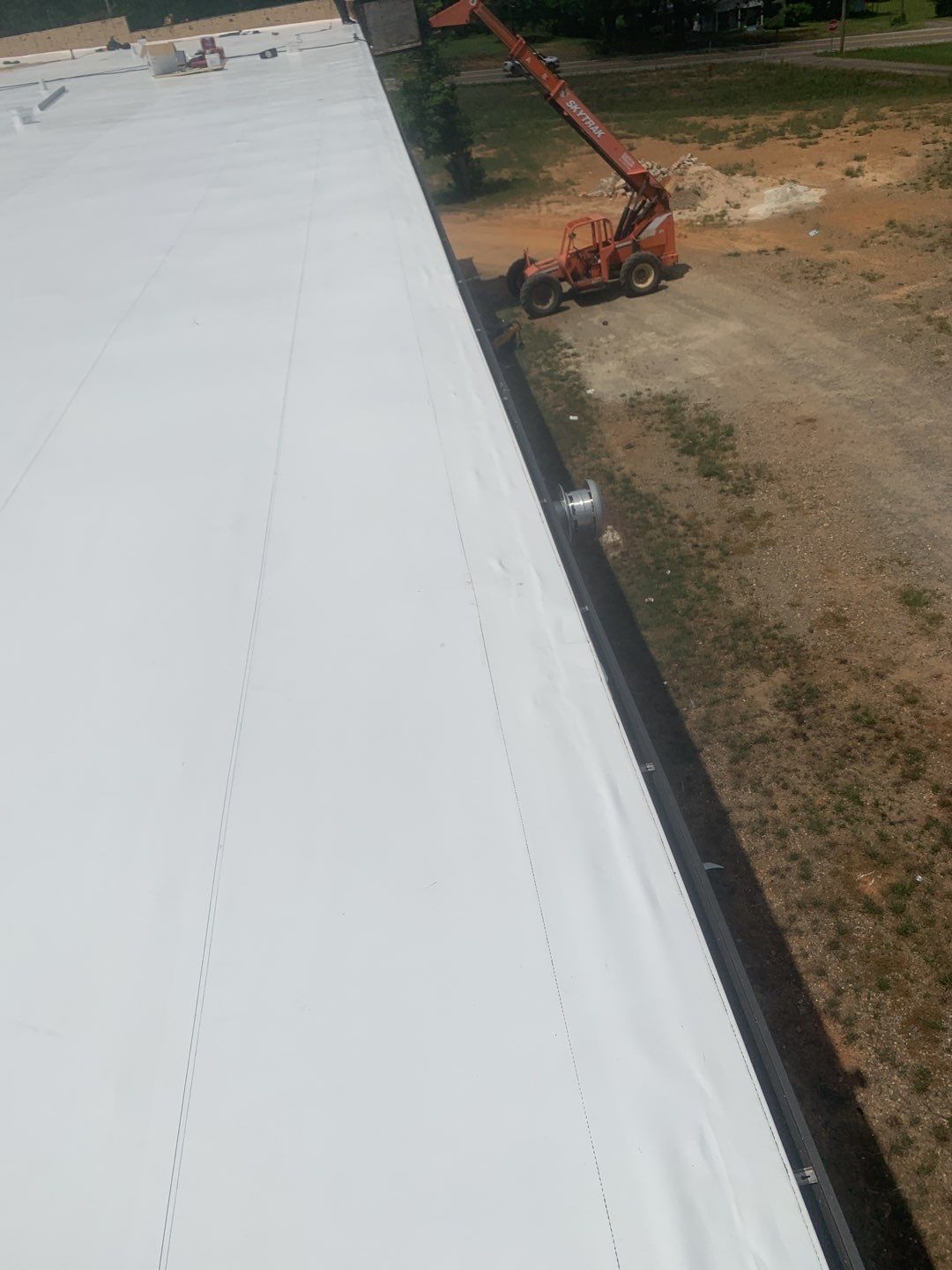 Commercial Roofing Installation using 50 mil PVC by Hostetler Roofing