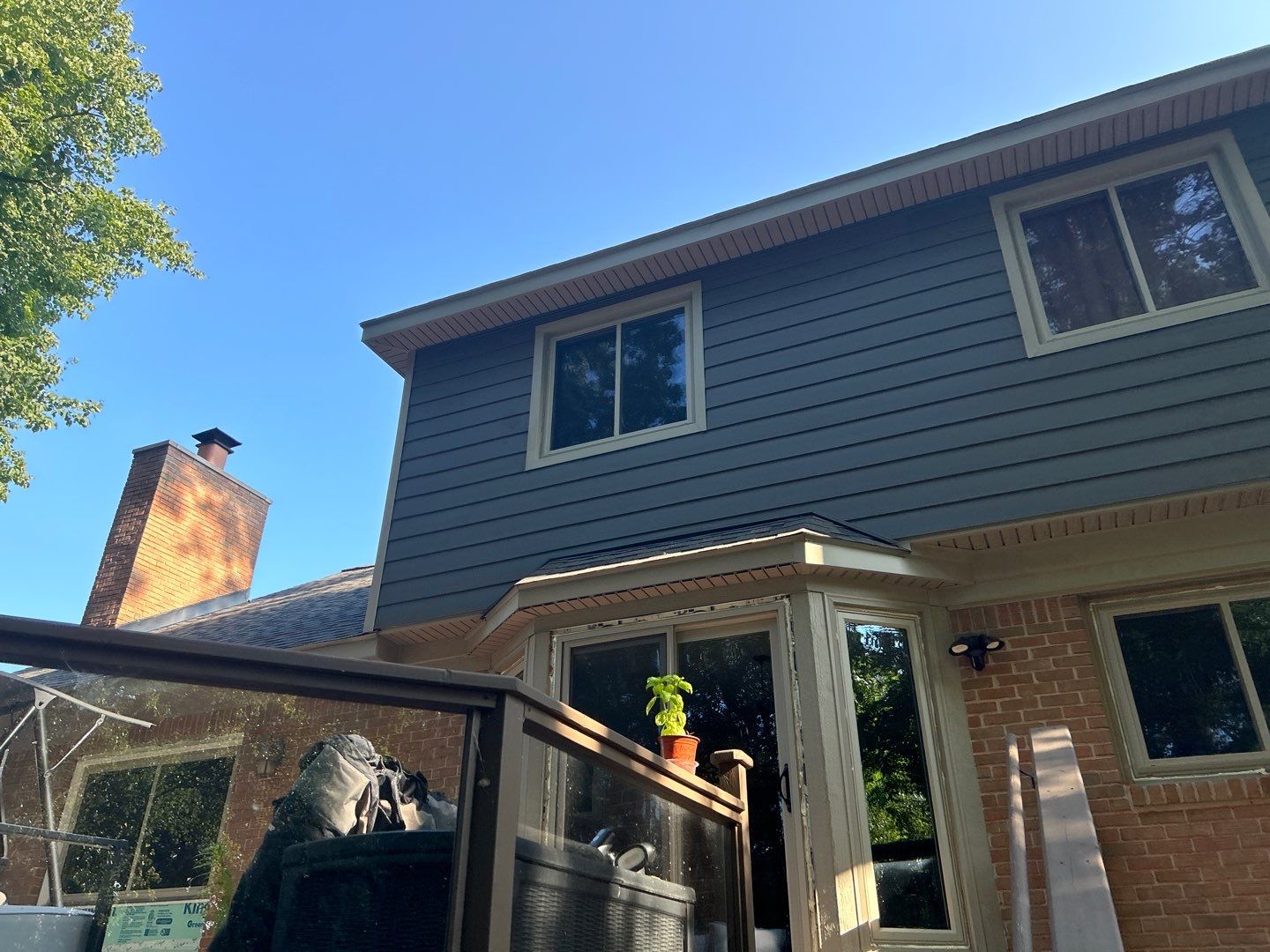 Roof Replacement using Owens Corning Peppercorn and Siding Replacement using Ascend Charcoal Smoke by 180 Contractors