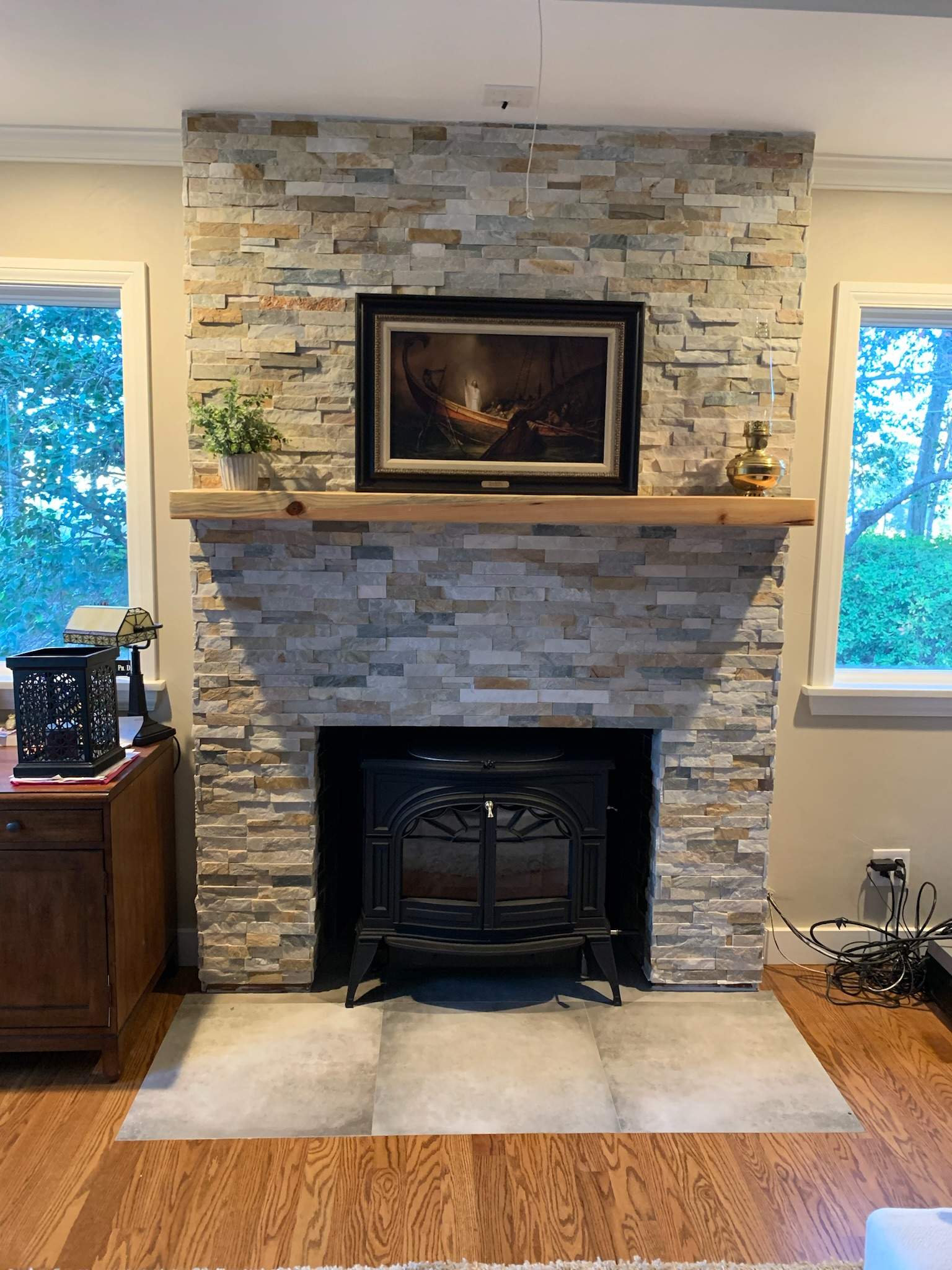 Wood Stove in Alcove by Premier Chimney and Roofing