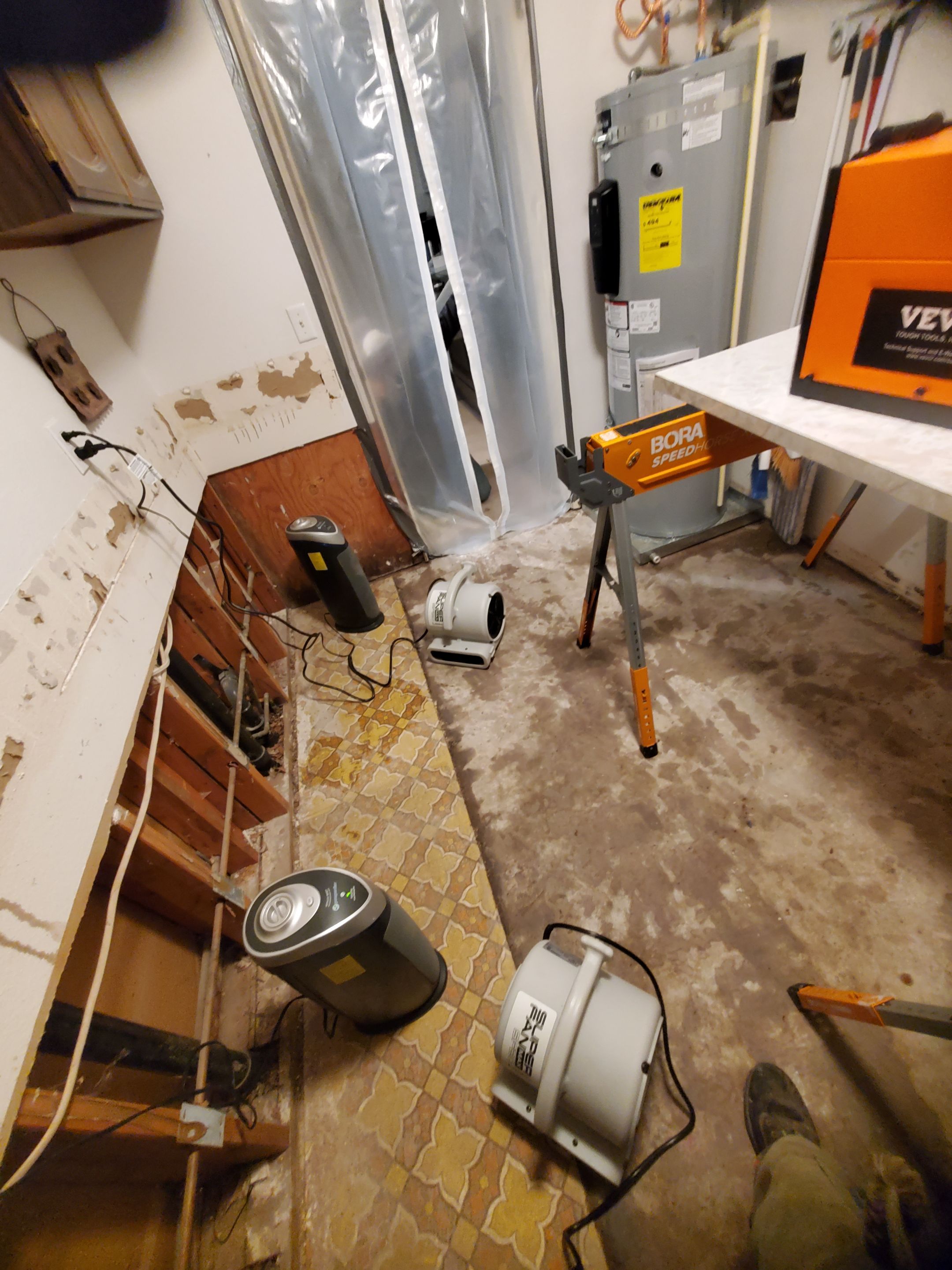 Water Damage using Air Movers by Construction Now LLC