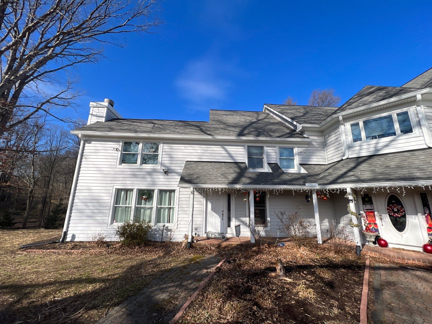 Roof, Gutter, Siding Replacement by American Home Contractors