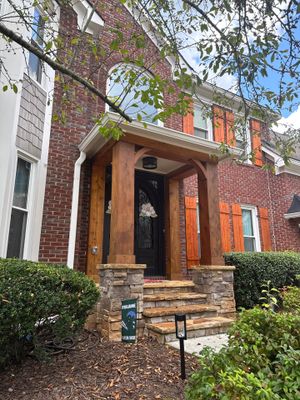 Exterior Modernization Featuring New Siding and Custom Wood Portico