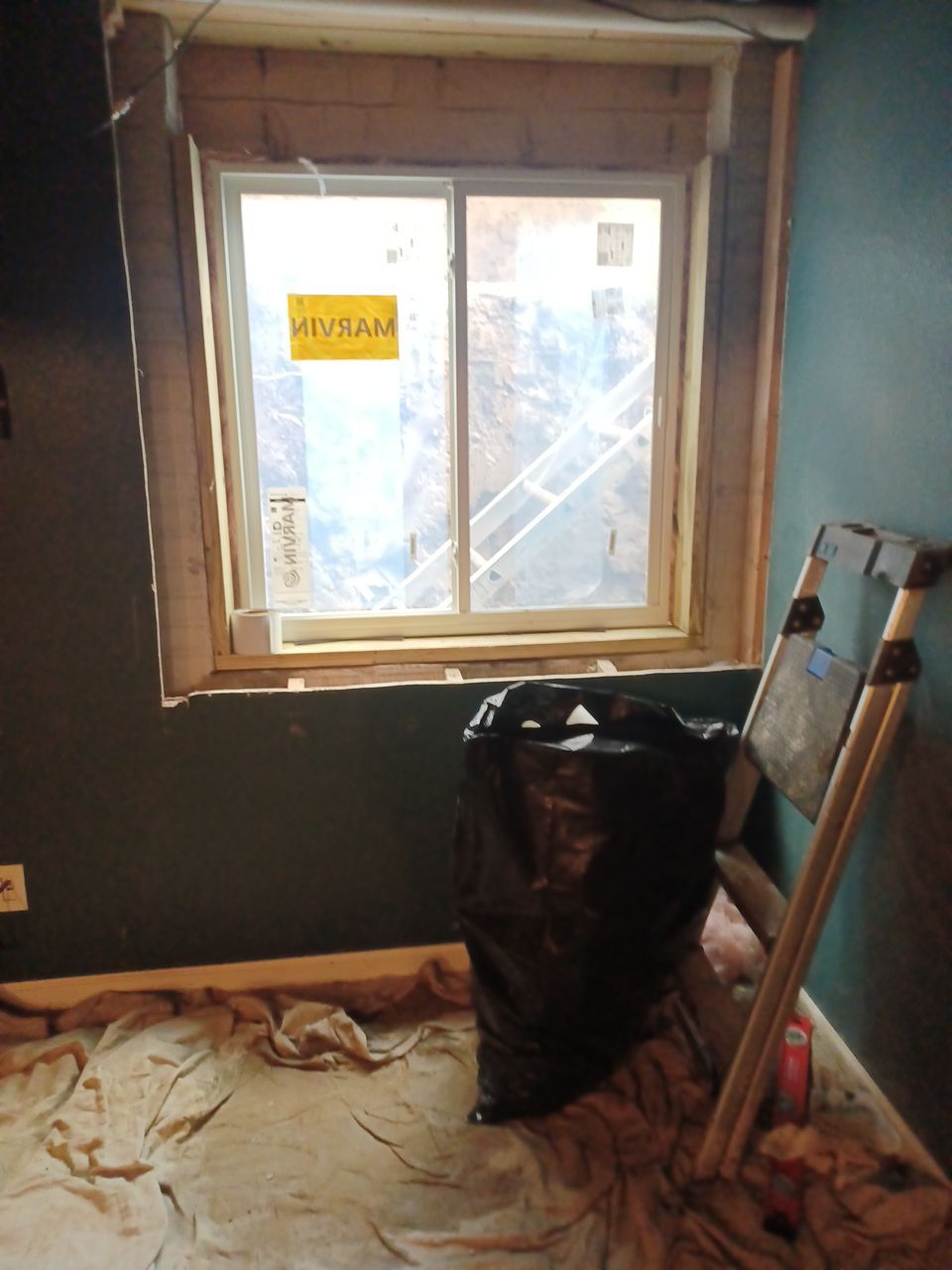 While Steel Egress Window Installation by Toledo Basement Repair