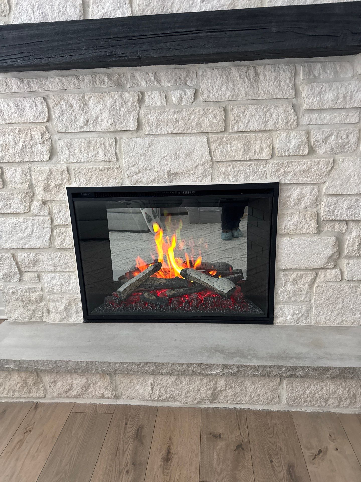 Electric Fireplace & Stone Veneer Installation by Leonard and Sons Building Services, Inc.