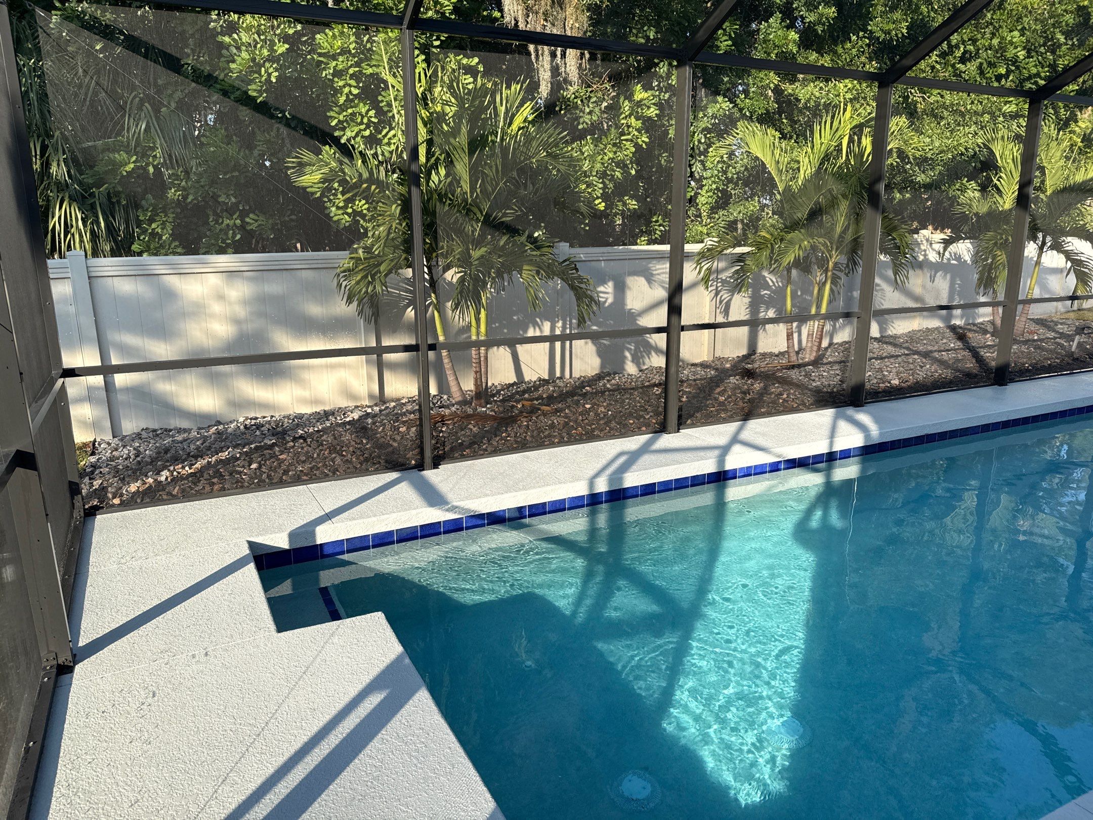 Painted Pool Deck & Screen Enclosure Cleaning | Heron Creek, Palmetto FL by Sunshine AquaWash