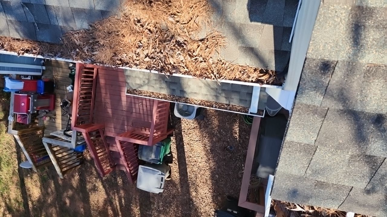 Gutter Cleaning using water by Power Wash Masters LLC