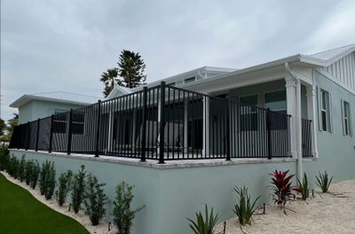 Aluminum Fence Installation using Black 3 Rail Aluminum Fence