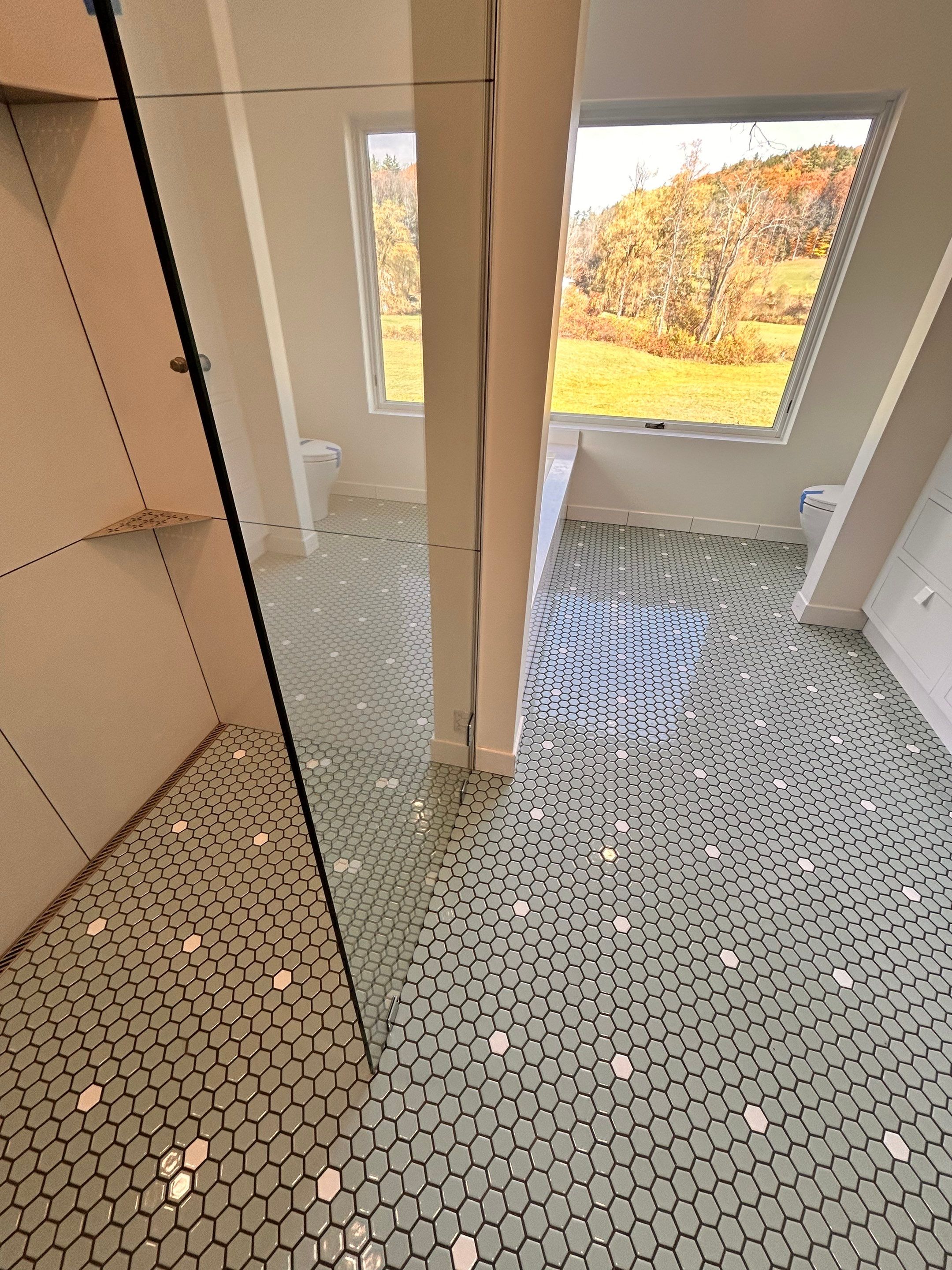 Frameless Spray Panel using Tempered Shower Glass by Cheshire Glass Company