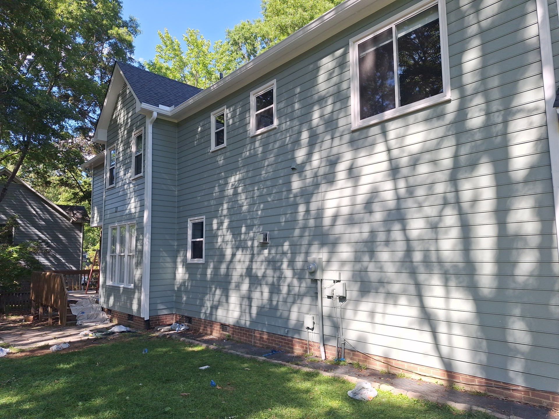 Siding Replacement and painting by GonzalezPainters & Contractors Inc 
