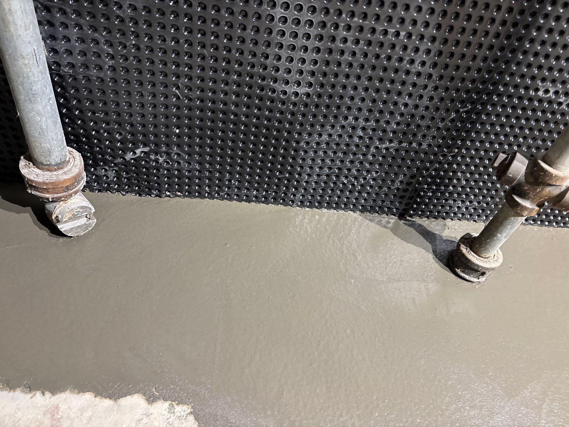 Interior Drain Tile & Buried Discharge in South Minneapolis by Waterproofing Northeast