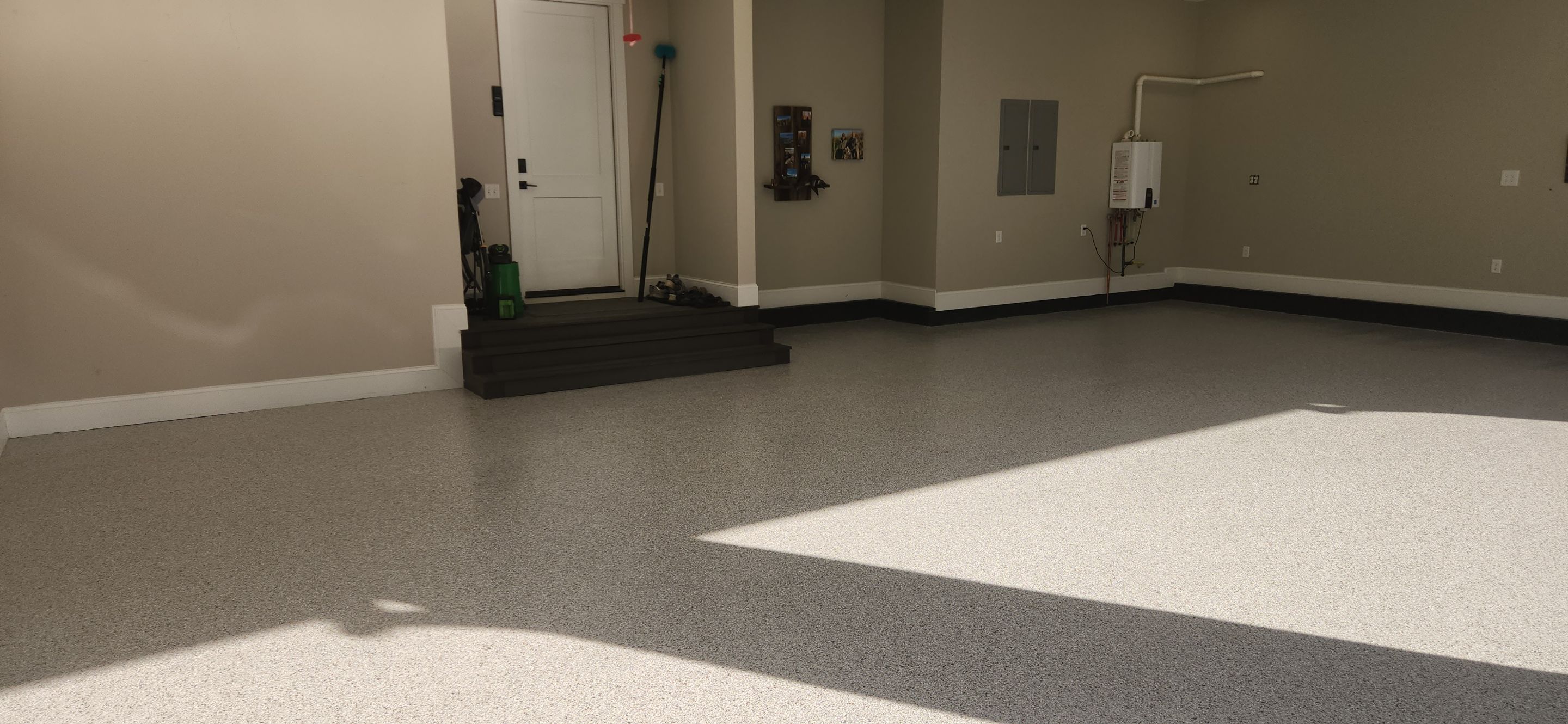Front Porch and Garage using Coyote & Pumice by Elite Floor Solutions