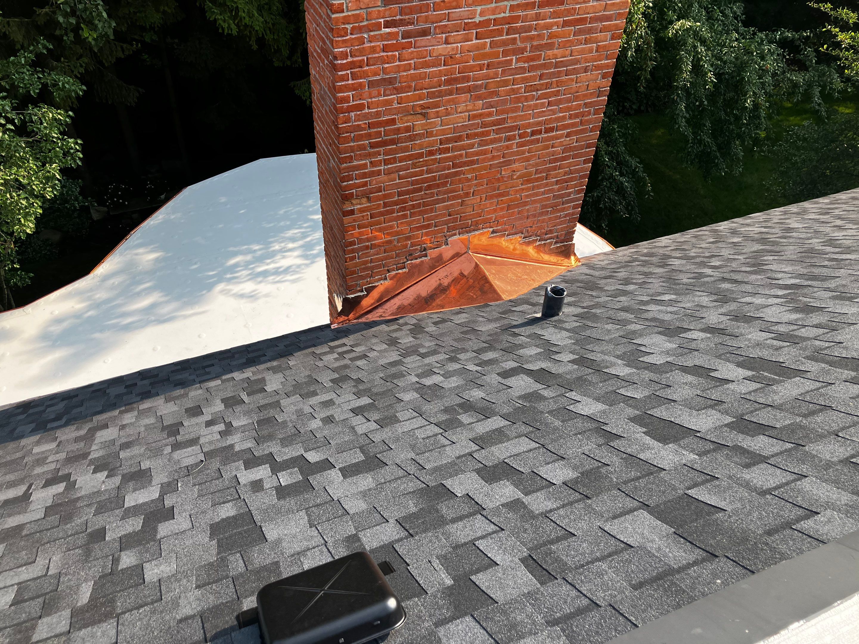 Flat Roof Replacement and Copper Gutter Installation by Custom Installations