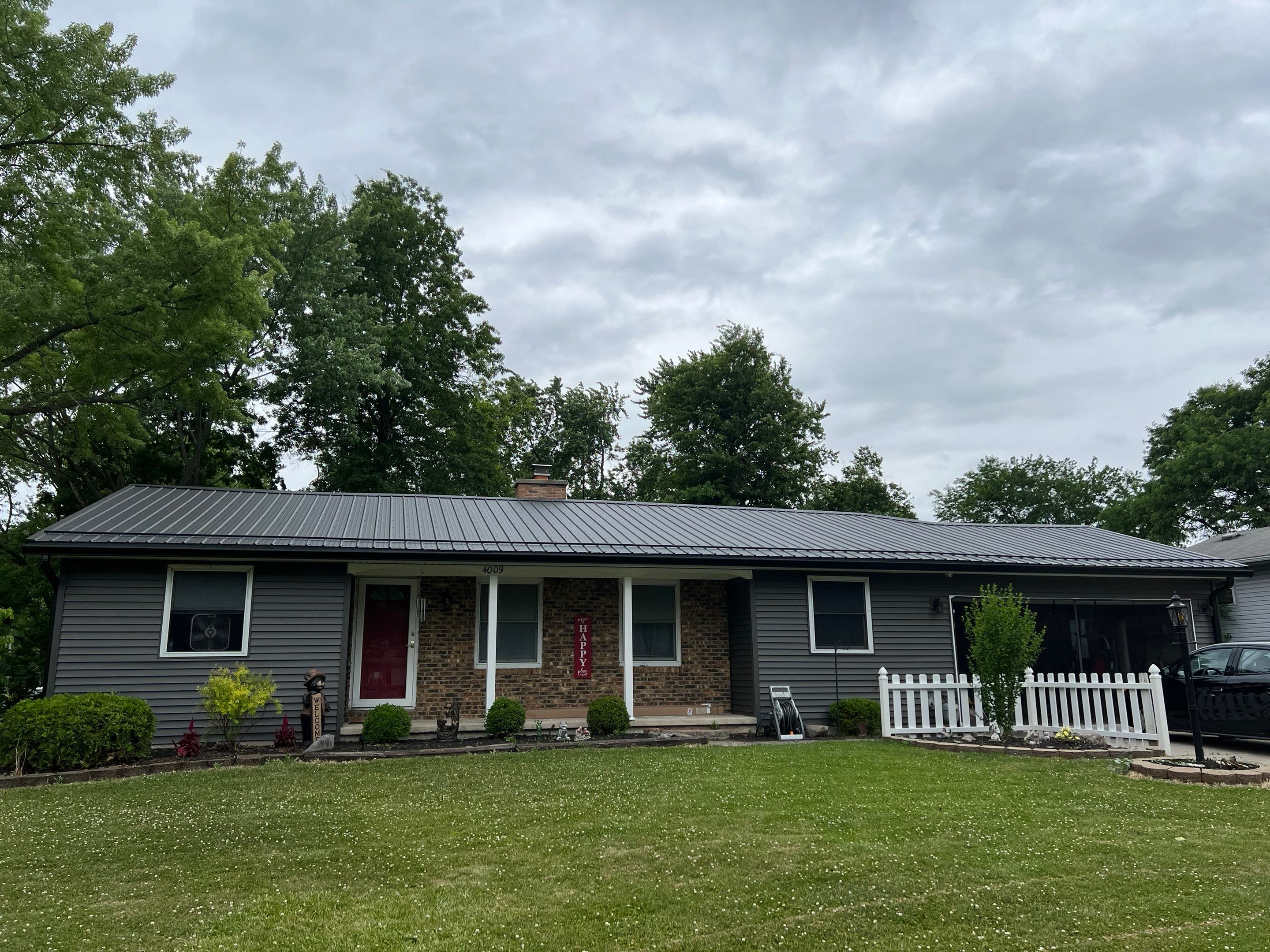 Complete Exterior Transformation - Exposed Fastener Roofing System by 4Ever Metal Roofing