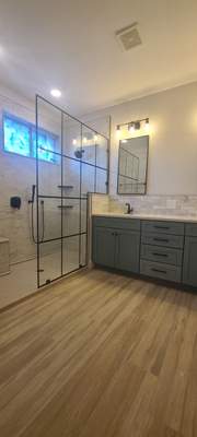 Stone Oak Bathroom Remodel with Paned Shower Glass