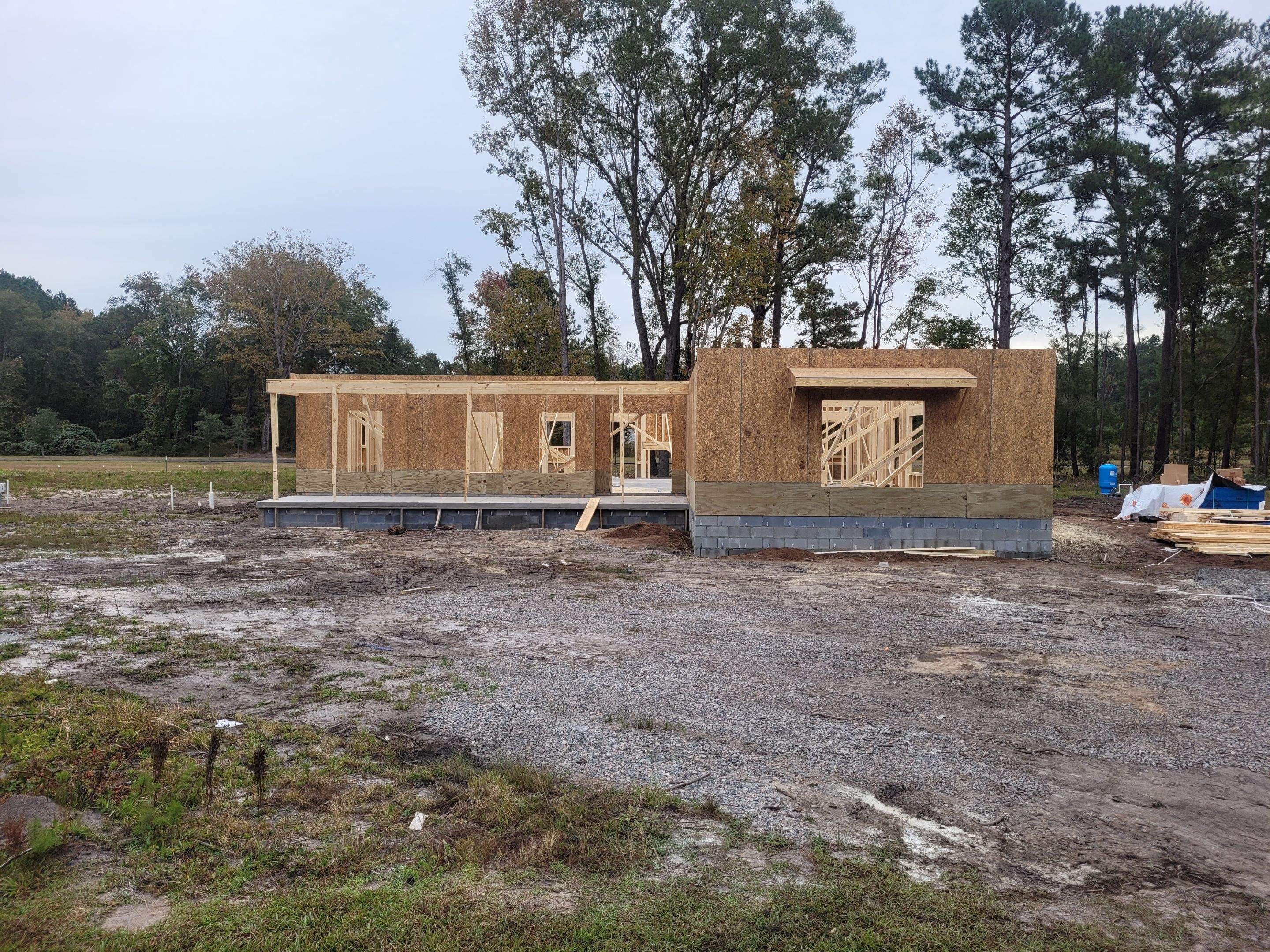 New Home Construction using brick and vertical vinyl by Cornerstone Home Builders, LLC