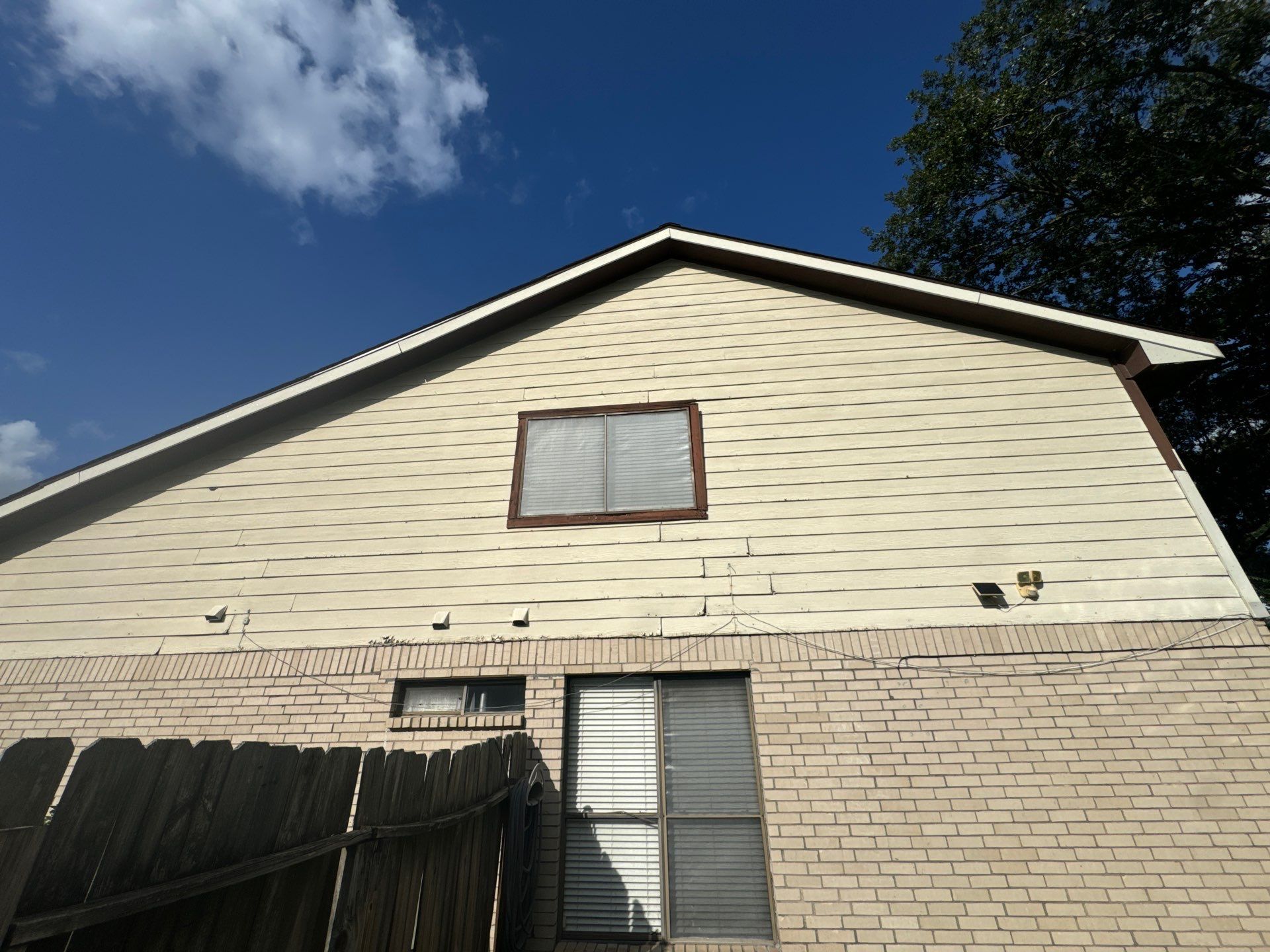 Siding Repair by Associates Roofing Unlimited